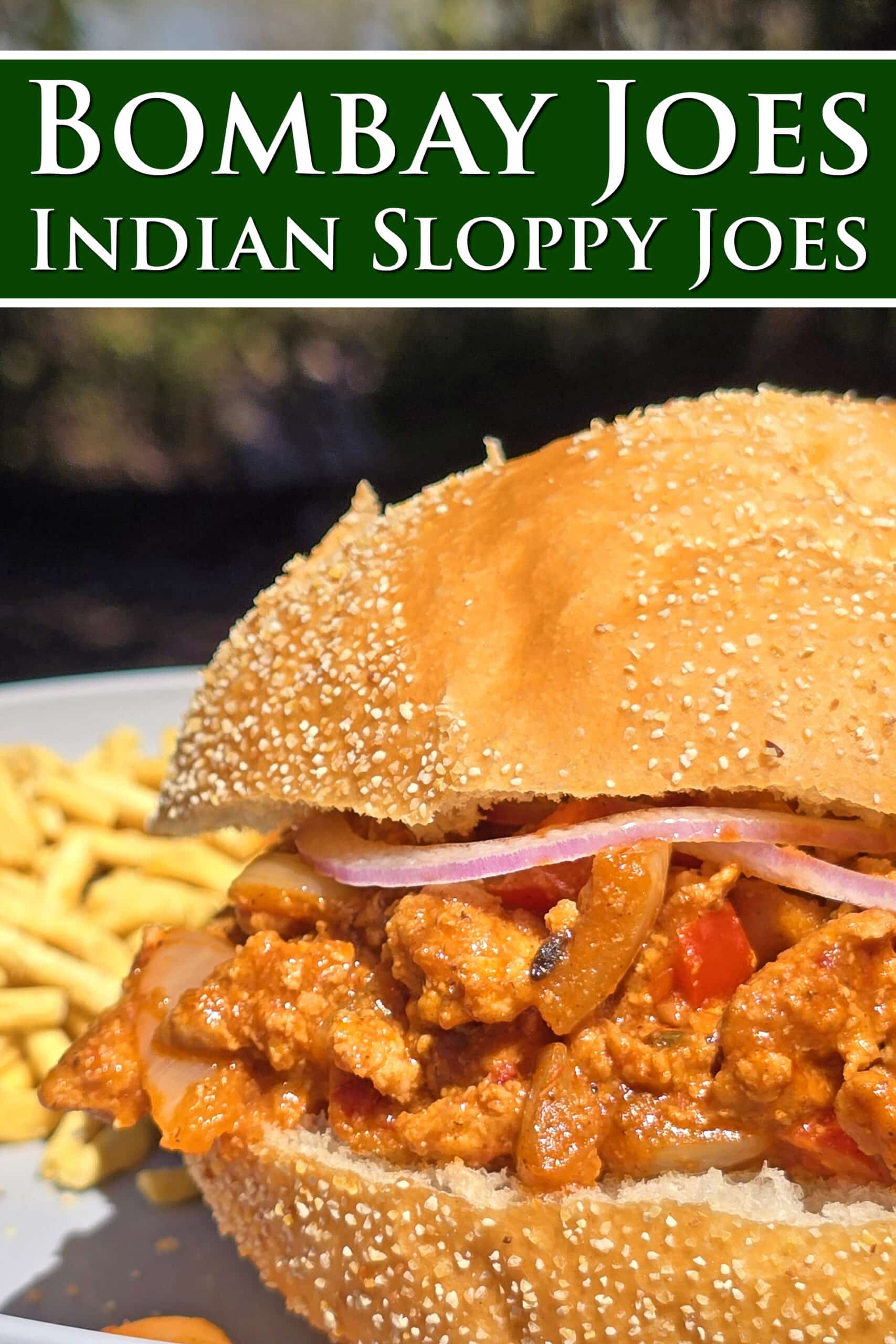 A butter chicken sloppy joes sandwich on a plate.  Overlaid text says Bombay Joes, Indian sloppy joes.