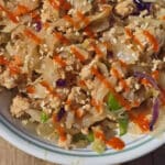 A bowl of egg roll in a bowl - shredded cabbage, ground beef, and more.