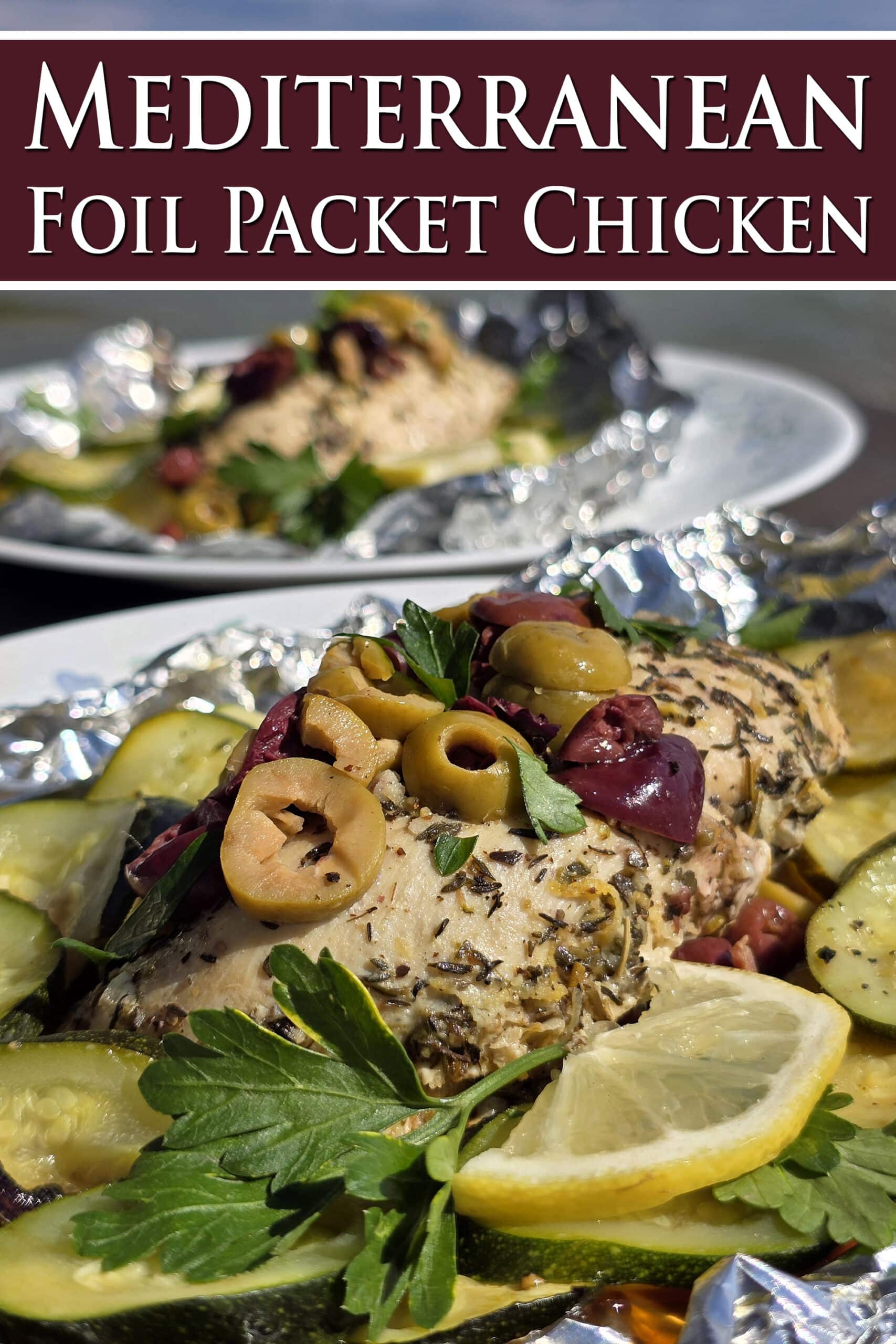 Souvlaki chicken foil packets with lemon slices, grilled zucchini, parsley, and olives.  Overlaid text says Mediterranean Foil Packet Chicken.