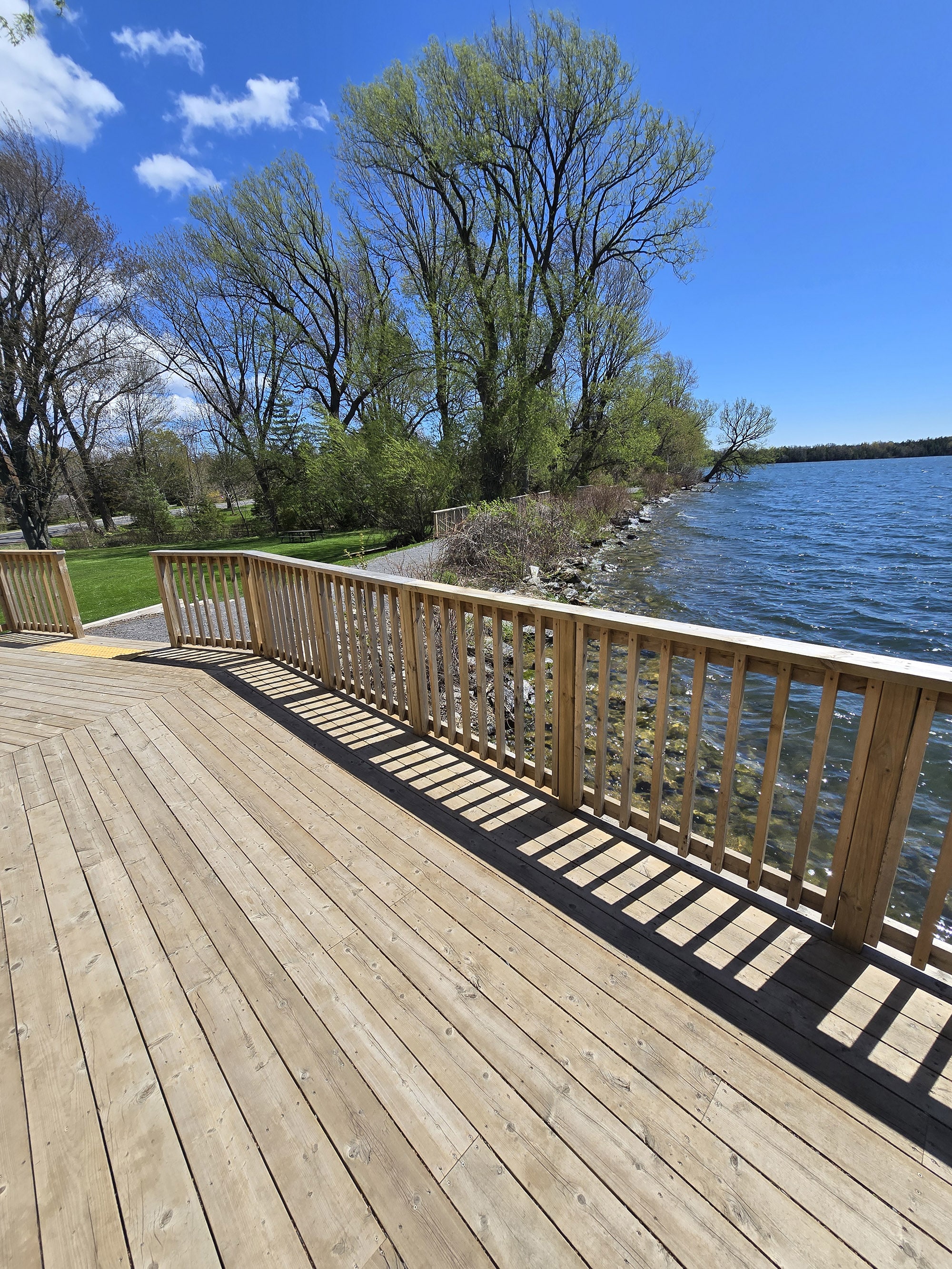 A wooden viewing platform deck on the side of Lake on the Mountain Provincial Park.