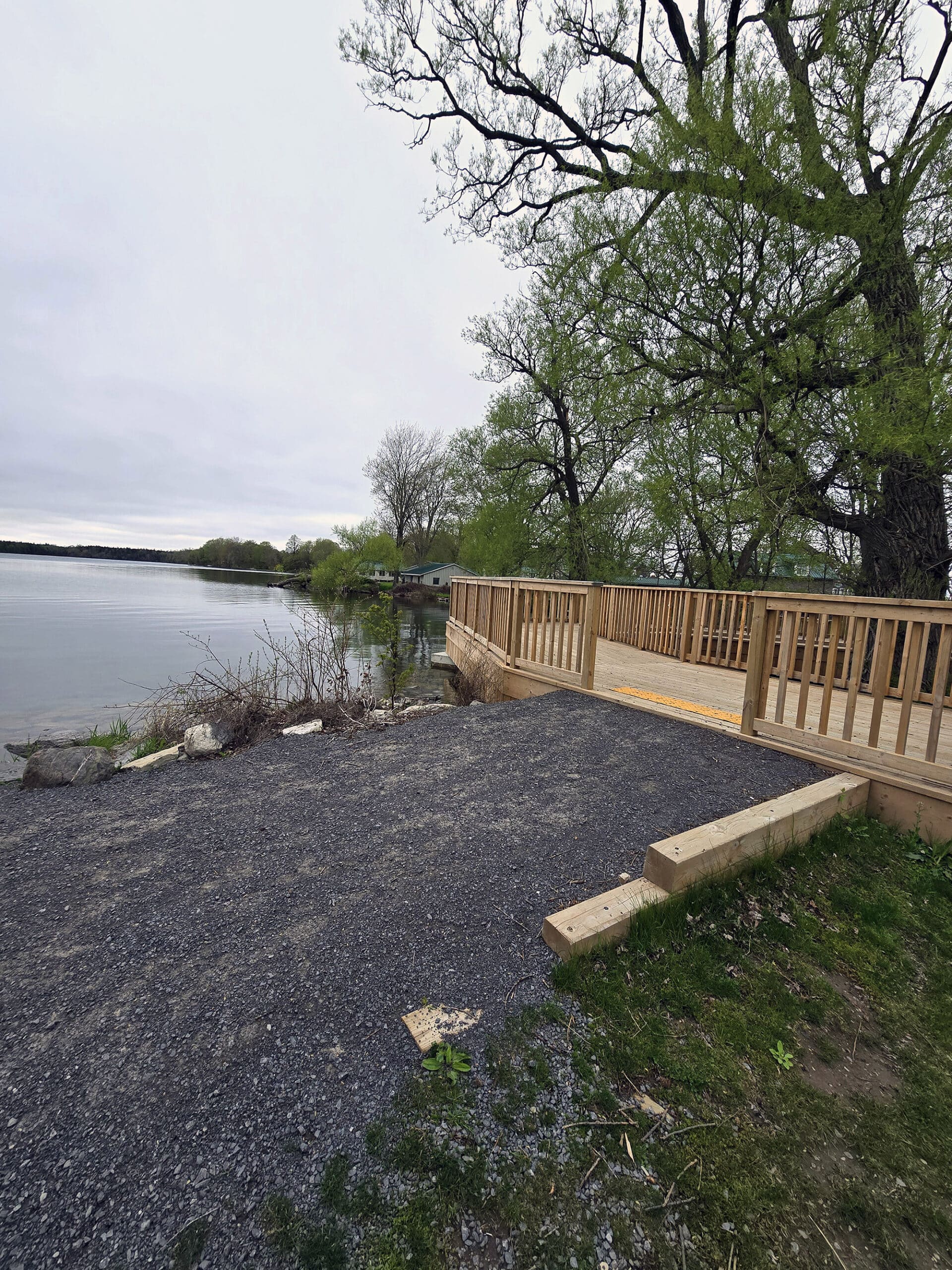 A wooden viewing platform deck on the side of Lake on the Mountain Provincial Park.