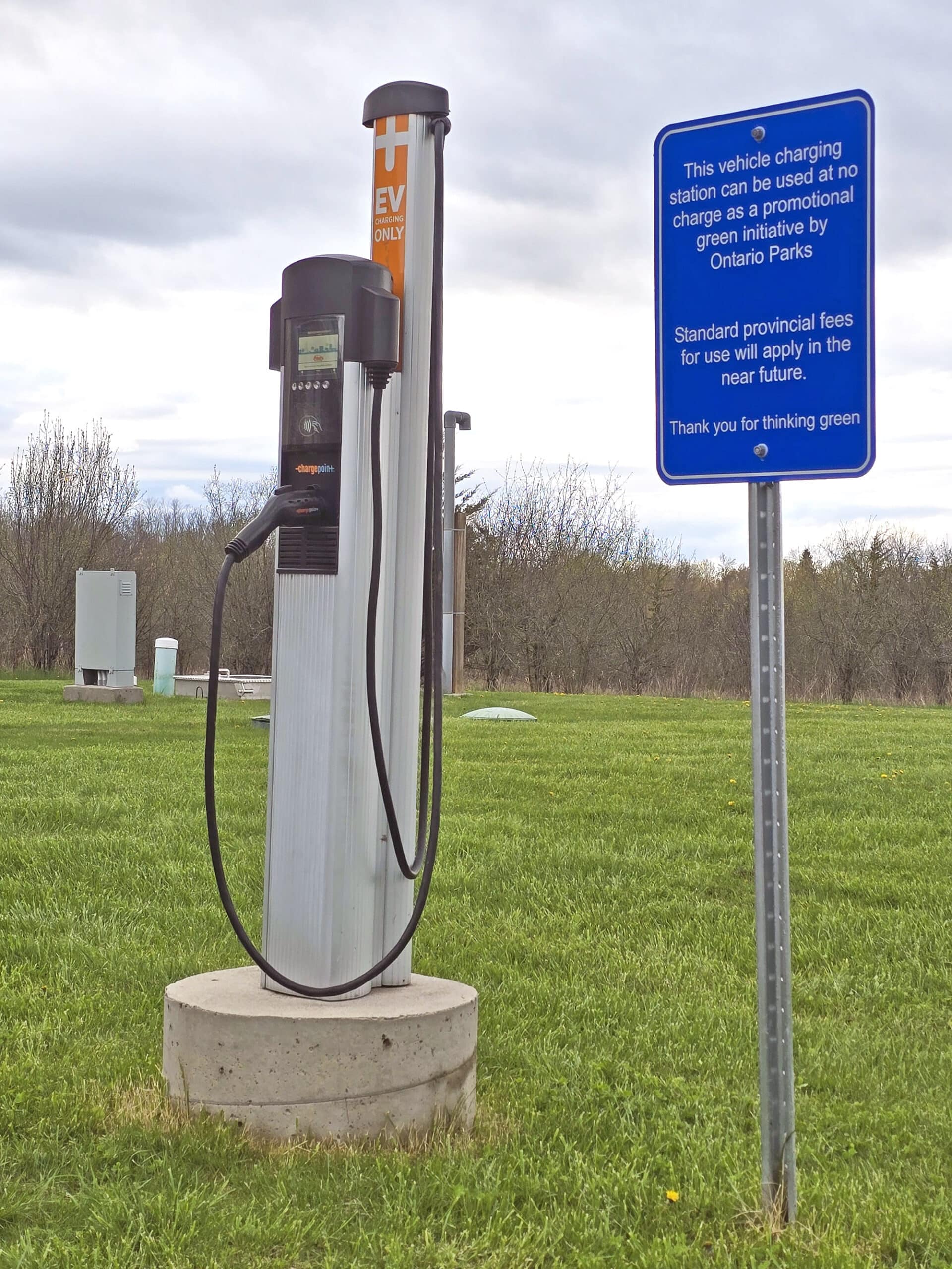 An EV charging tower at Sandbanks provincial park.