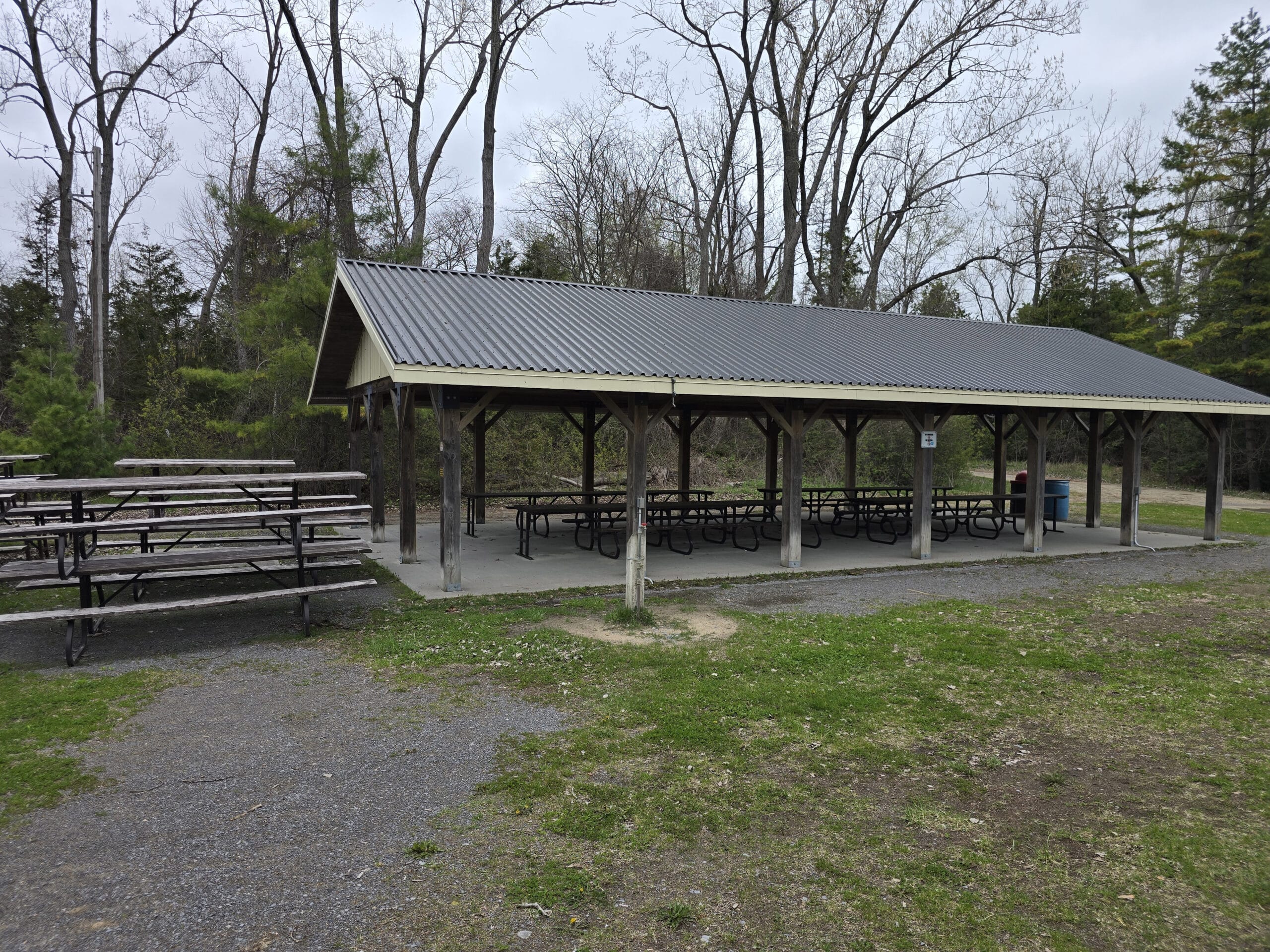 A large covered picnic shelter at sandbanks provincial park.