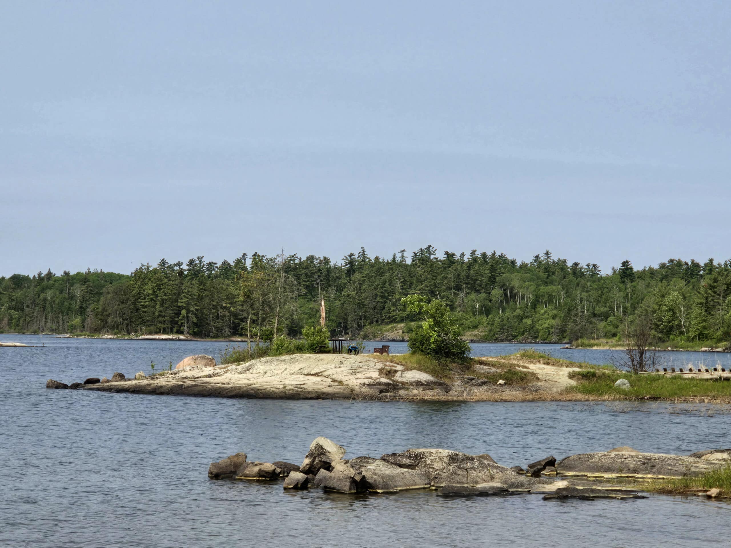 A small peninsula with a campsite on it.