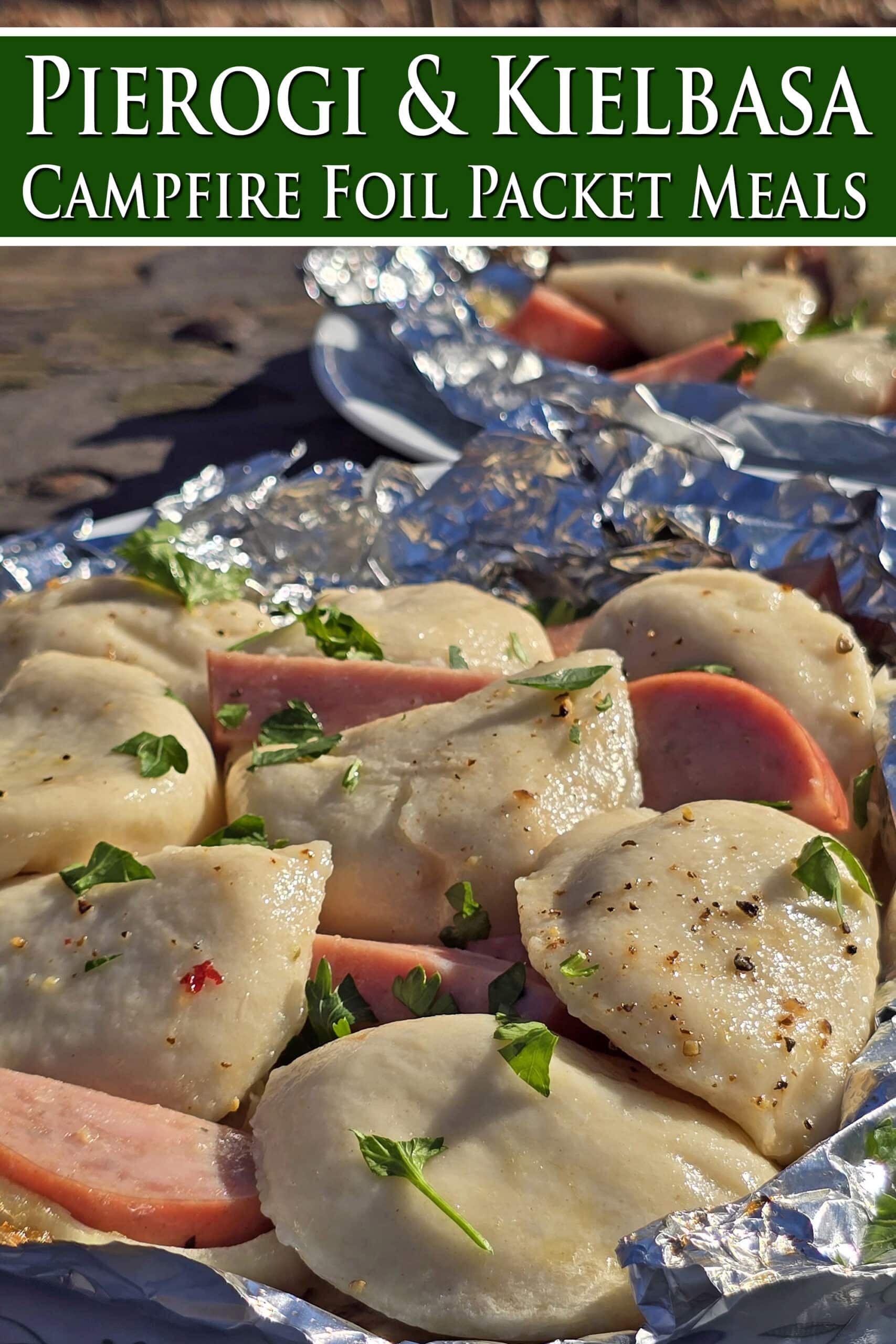 2 foil packets of steamed perogies and sausage on a campground picnic table. Overlaid text says pierogi and kielbasa campfire foil packet meals.