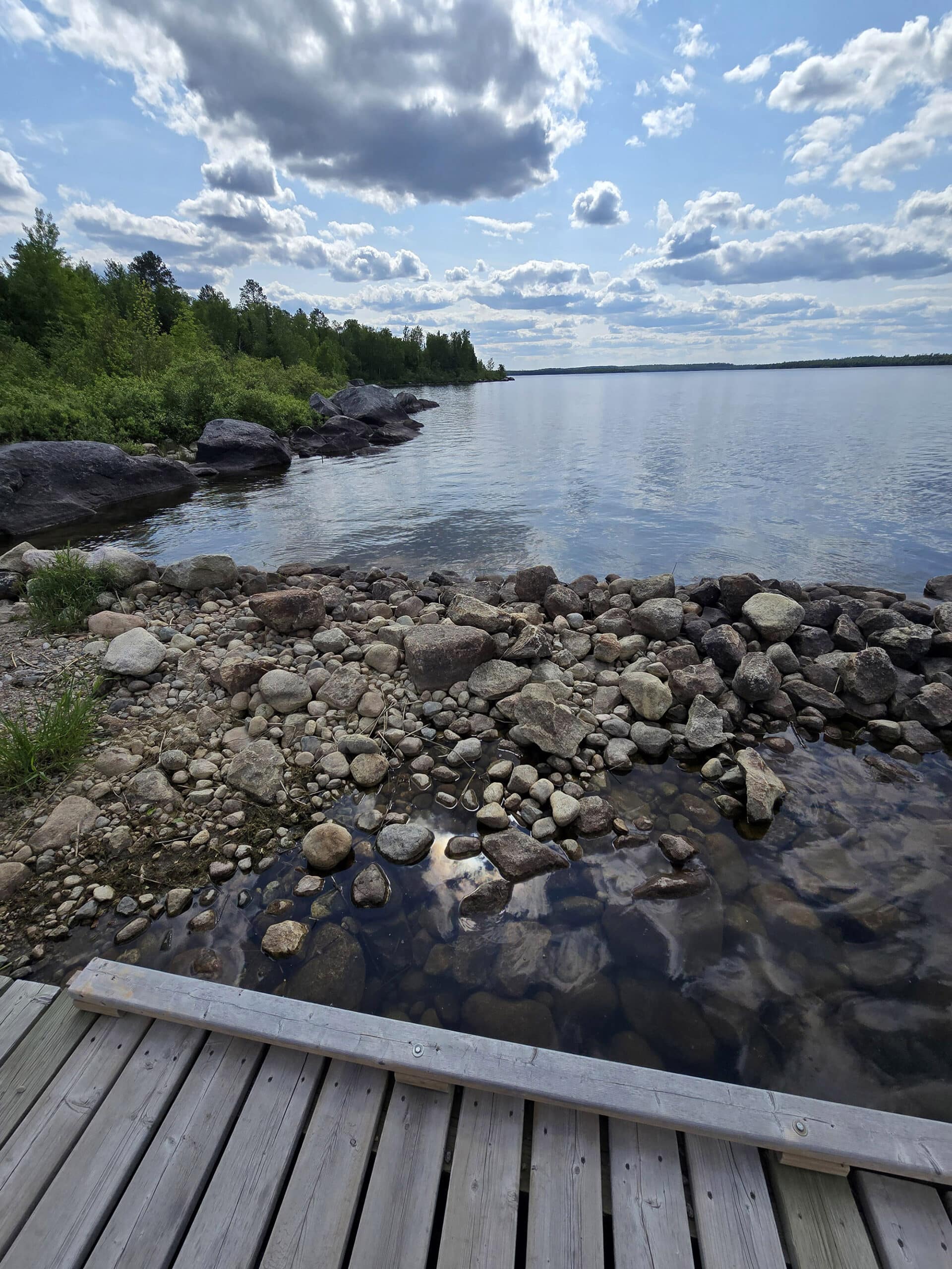 A rocky shoreline on Sandbar Lake.