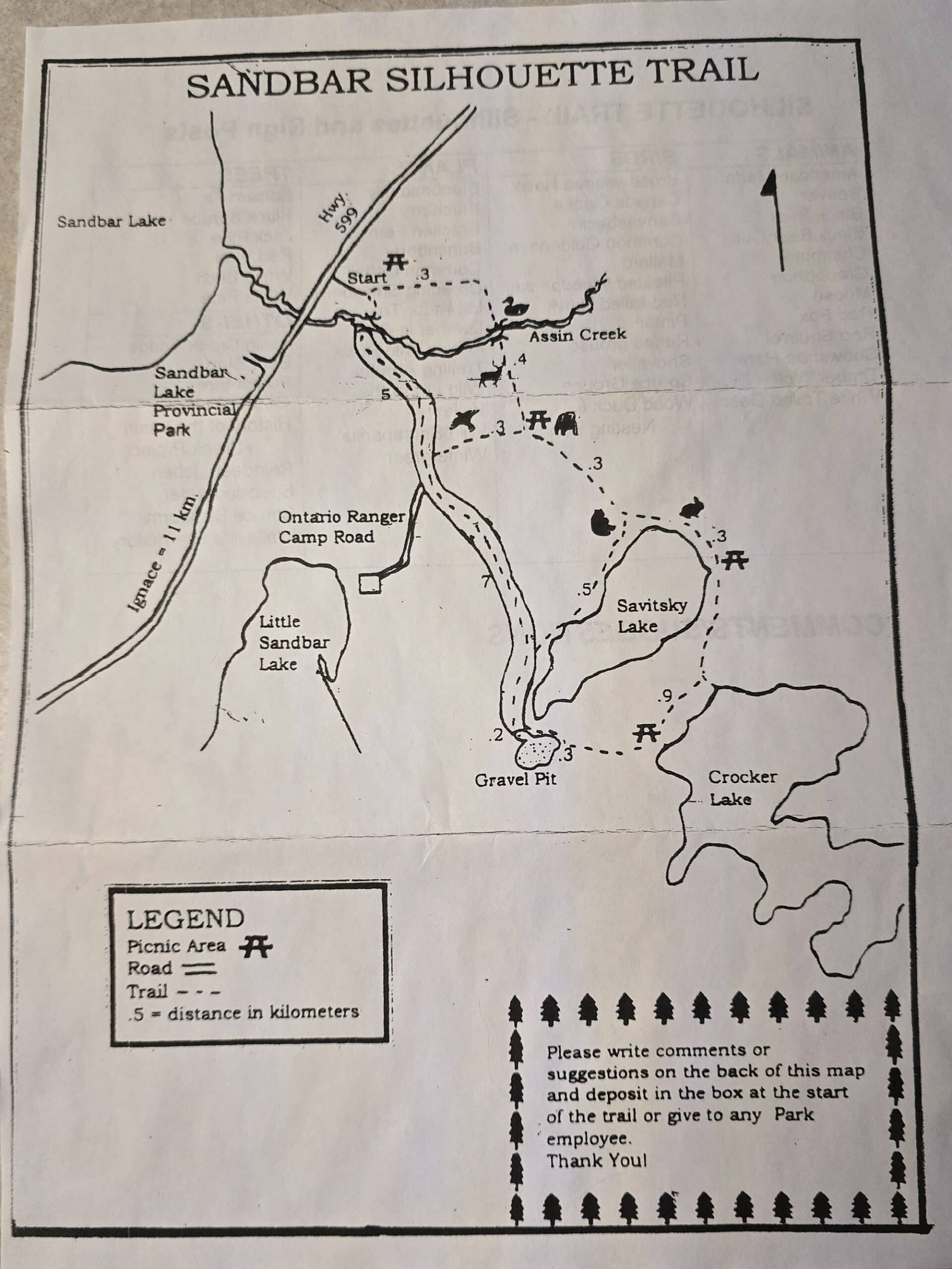 A black and white photocopy of a hand drawn trail map.