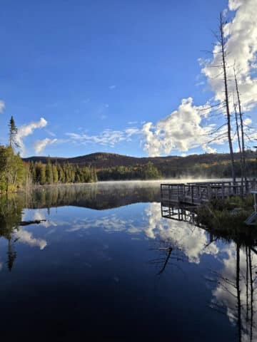 A boardwalk on a still lake on the Trappers Trail in Lake Superior Provincial Park.
