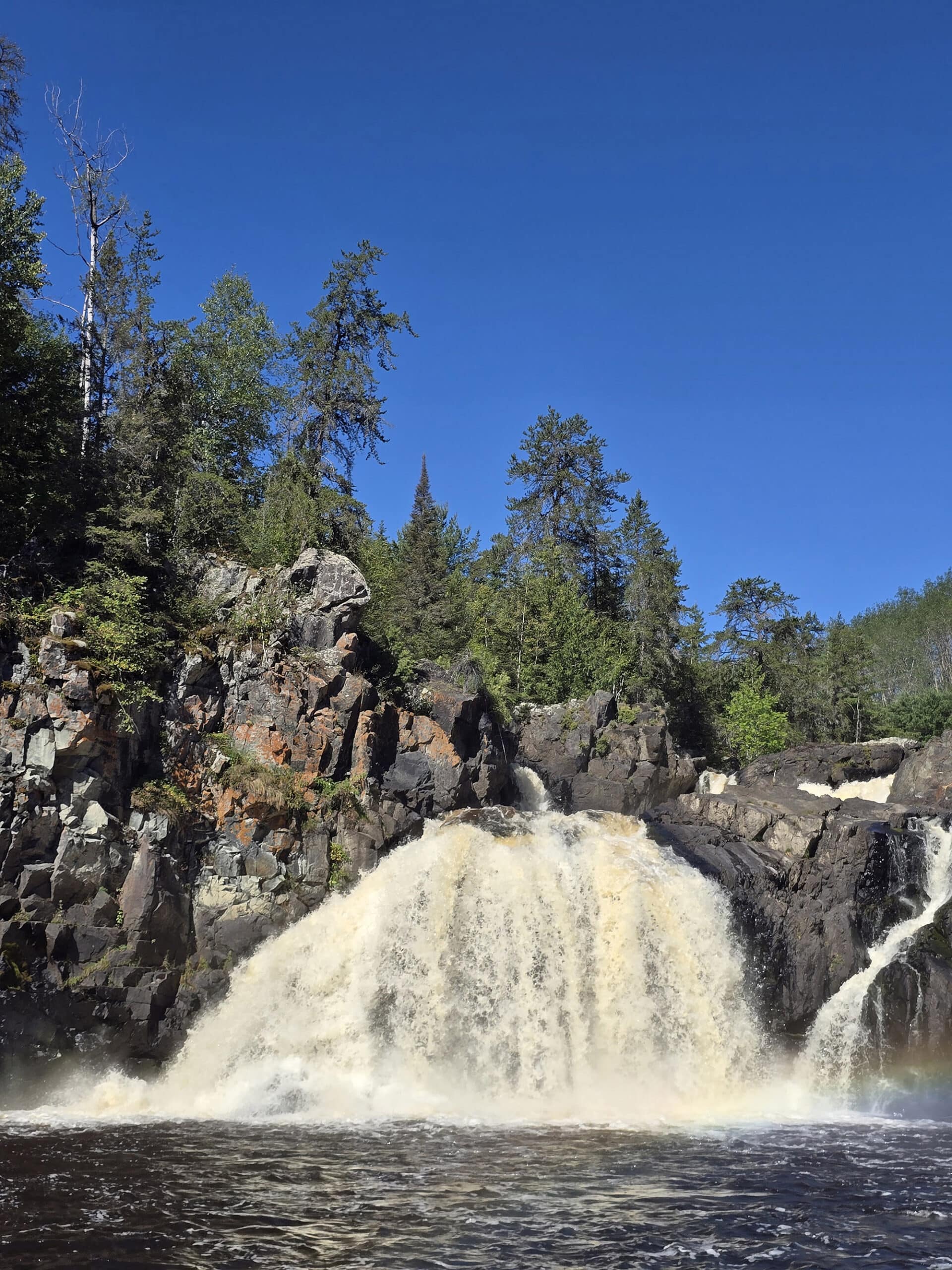 A tall waterfall at Kap-Kig-Iwan Provincial Park.