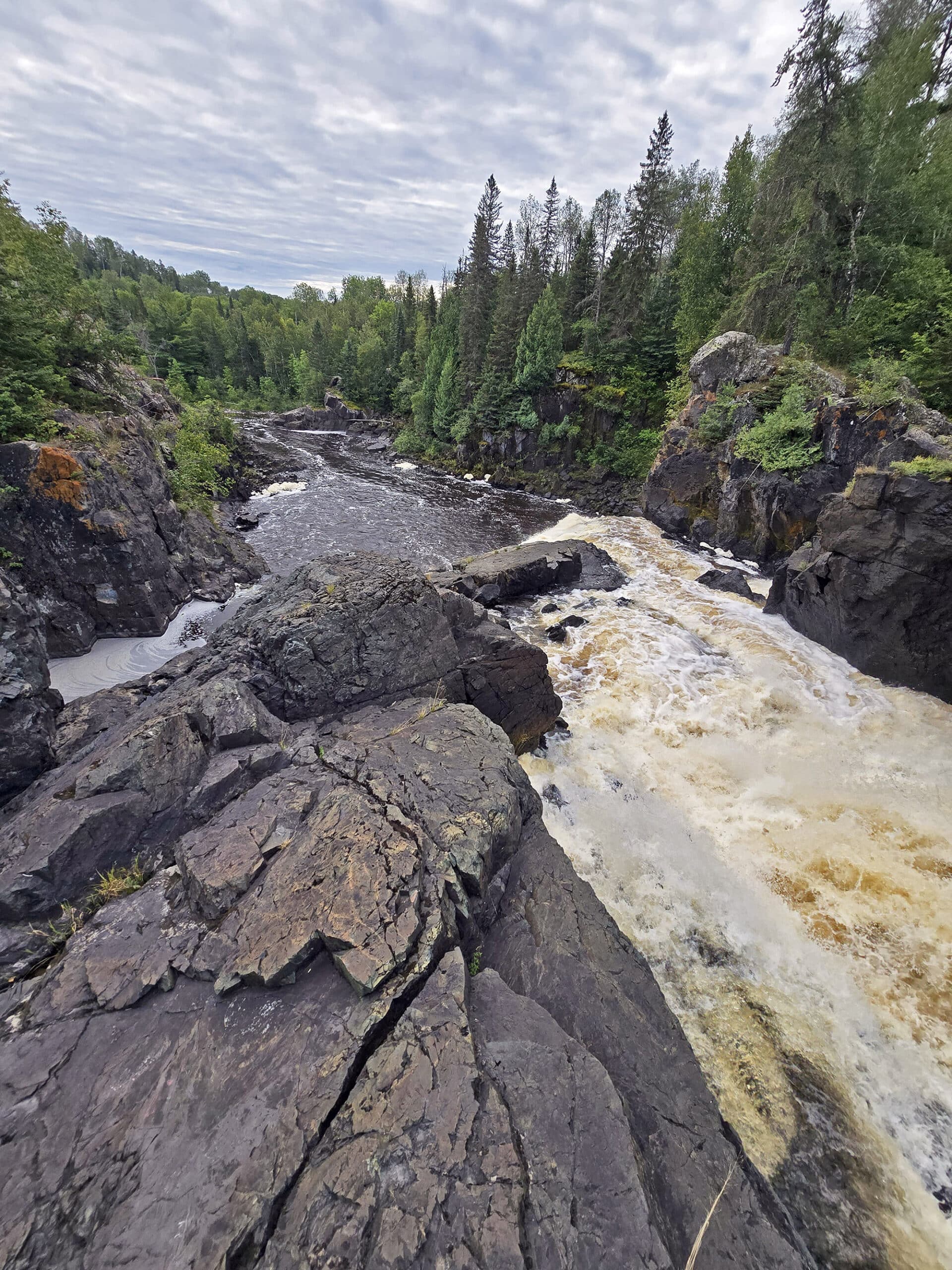The view from the top of a waterfall at Kap-Kig-Iwan Provincial Park.