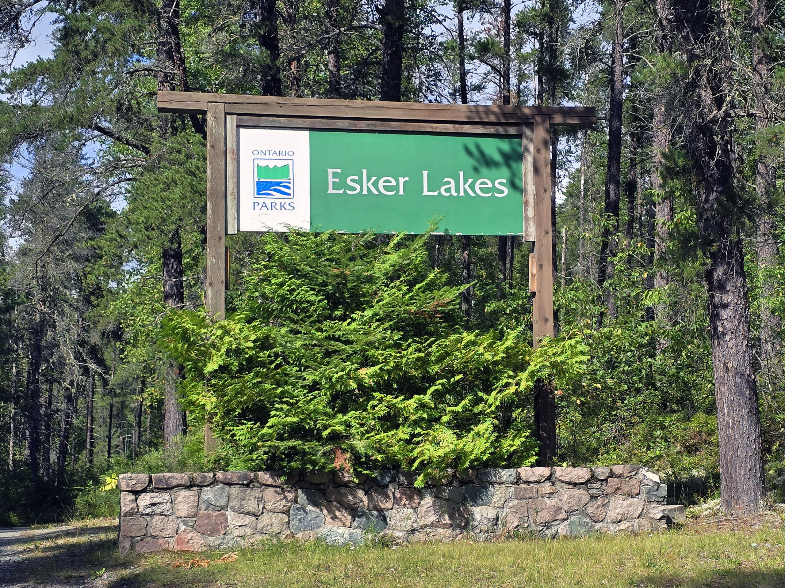The esker lakes provincial park road sign.