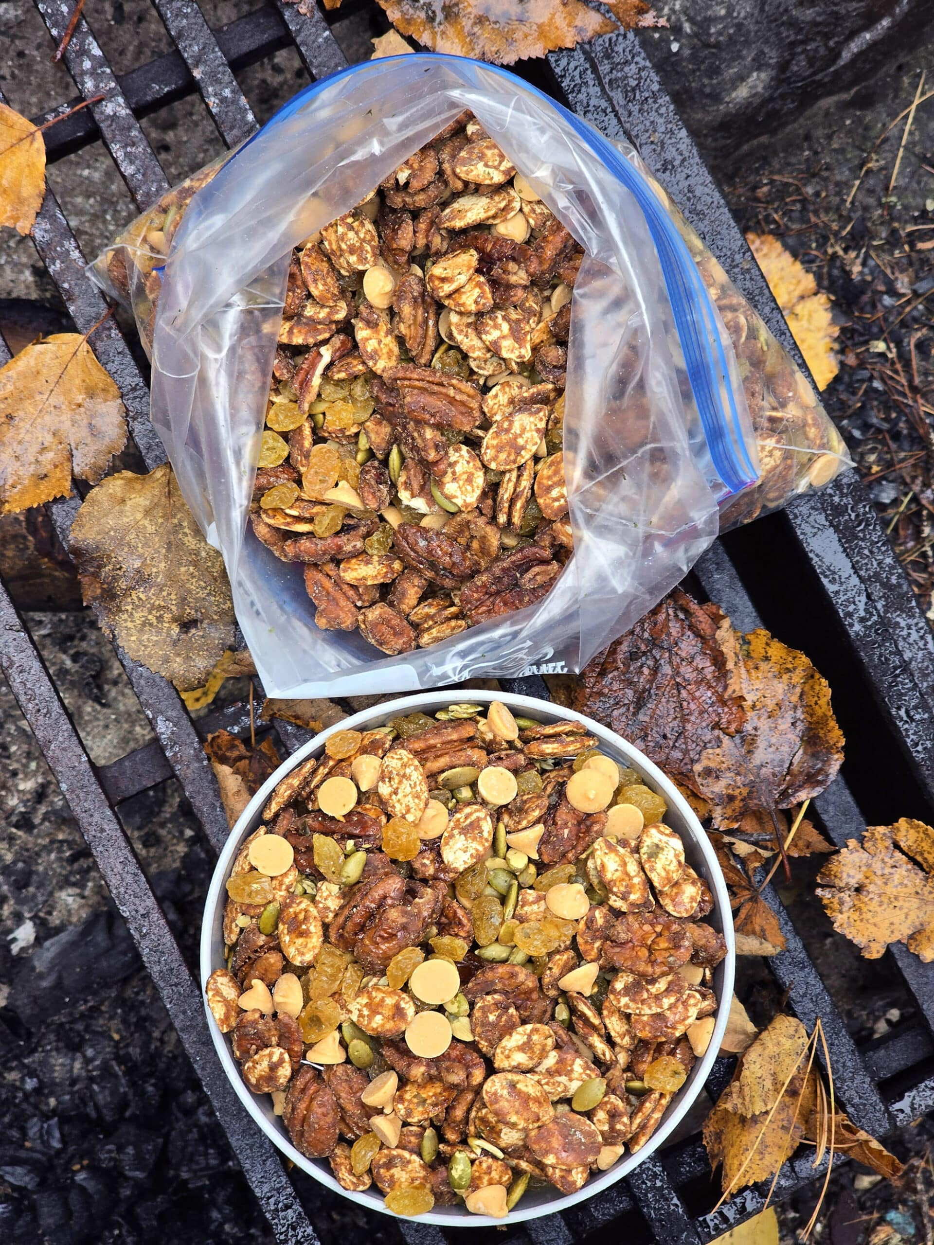 A bowl and a bag of homemade pumpkin spiced trail mix.