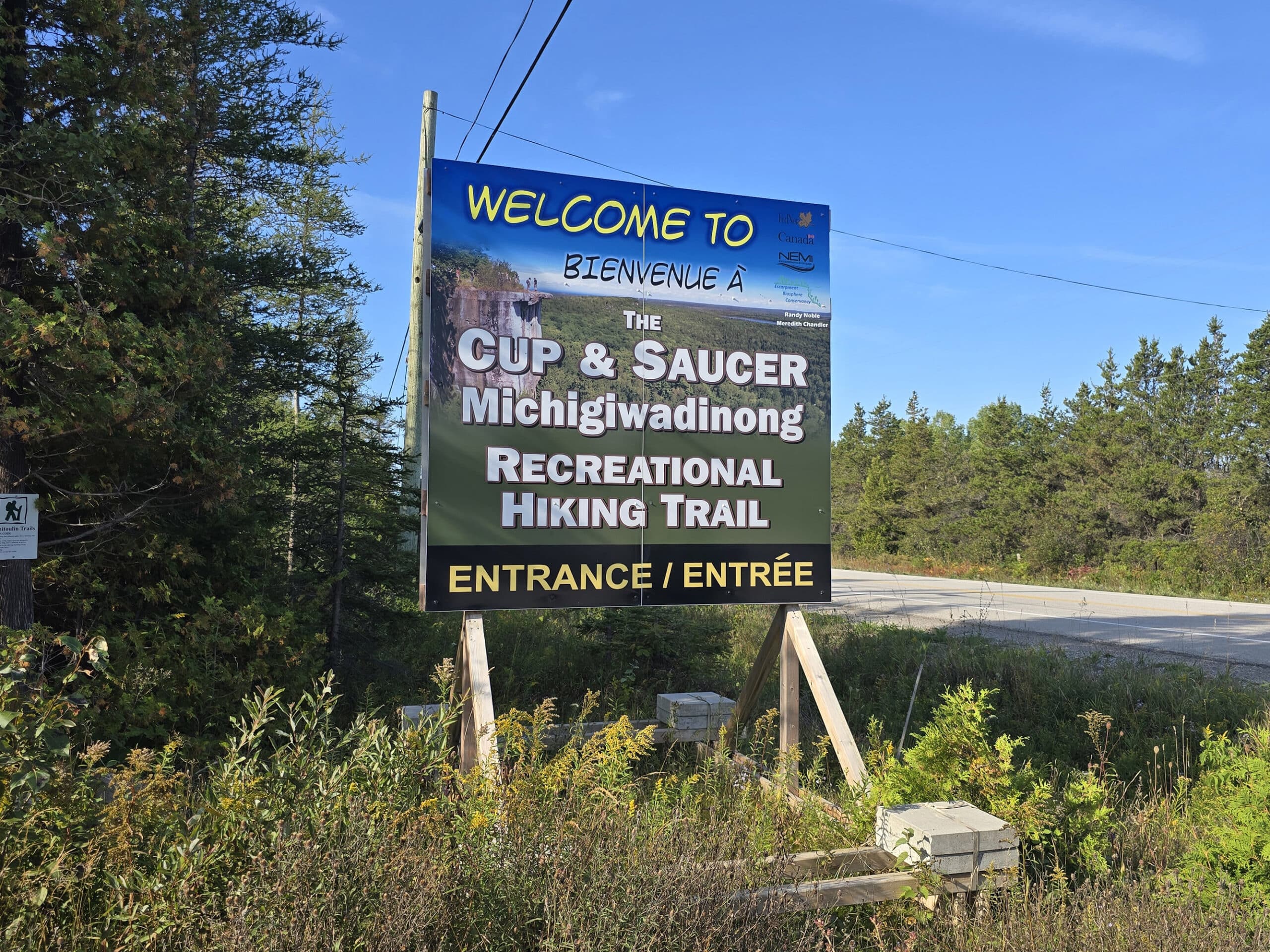 The cup and saucer nature reserve and trail highway sign.