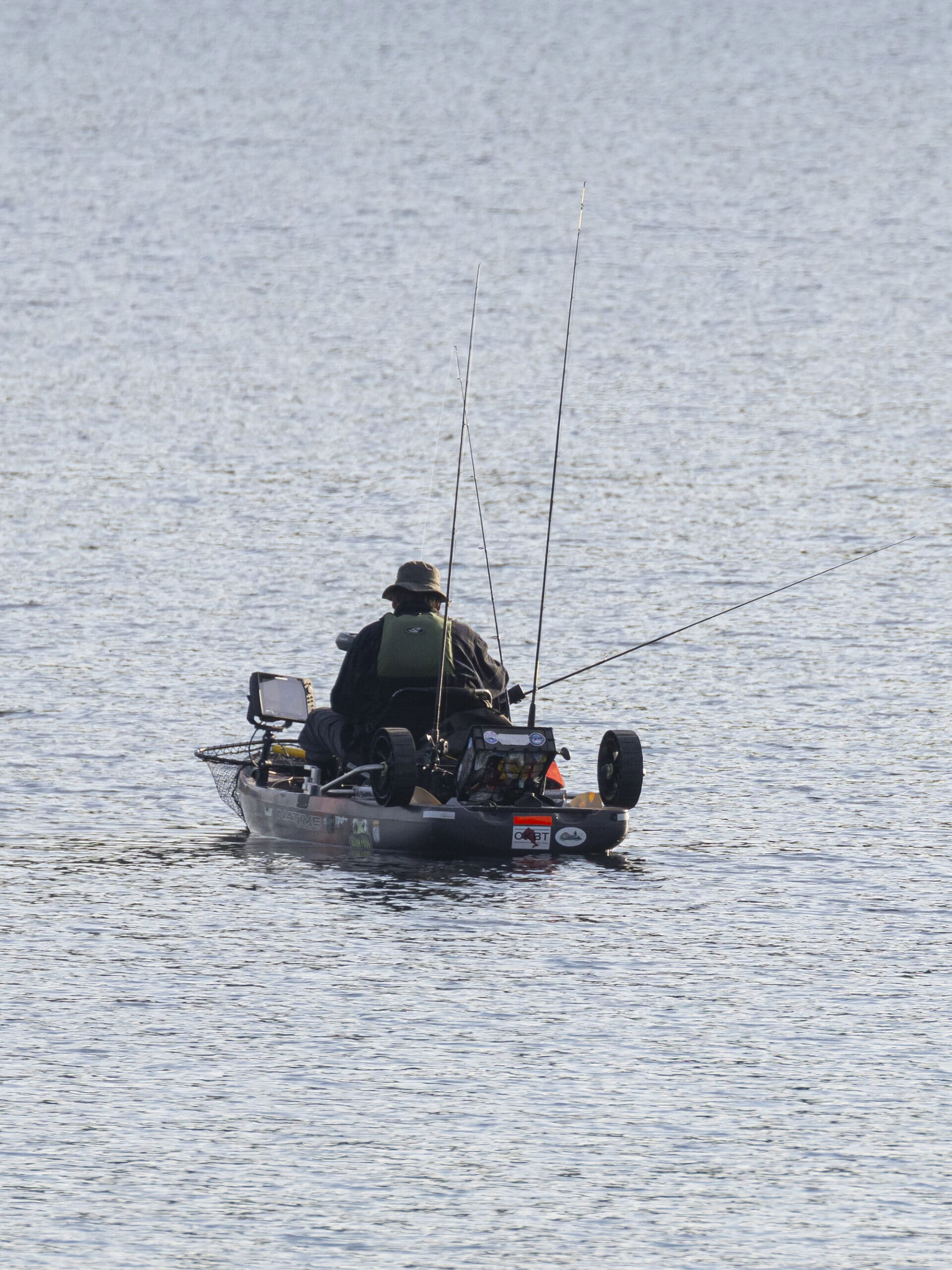 A small fishing boat on stormy lake at Restoule Provincial Park.