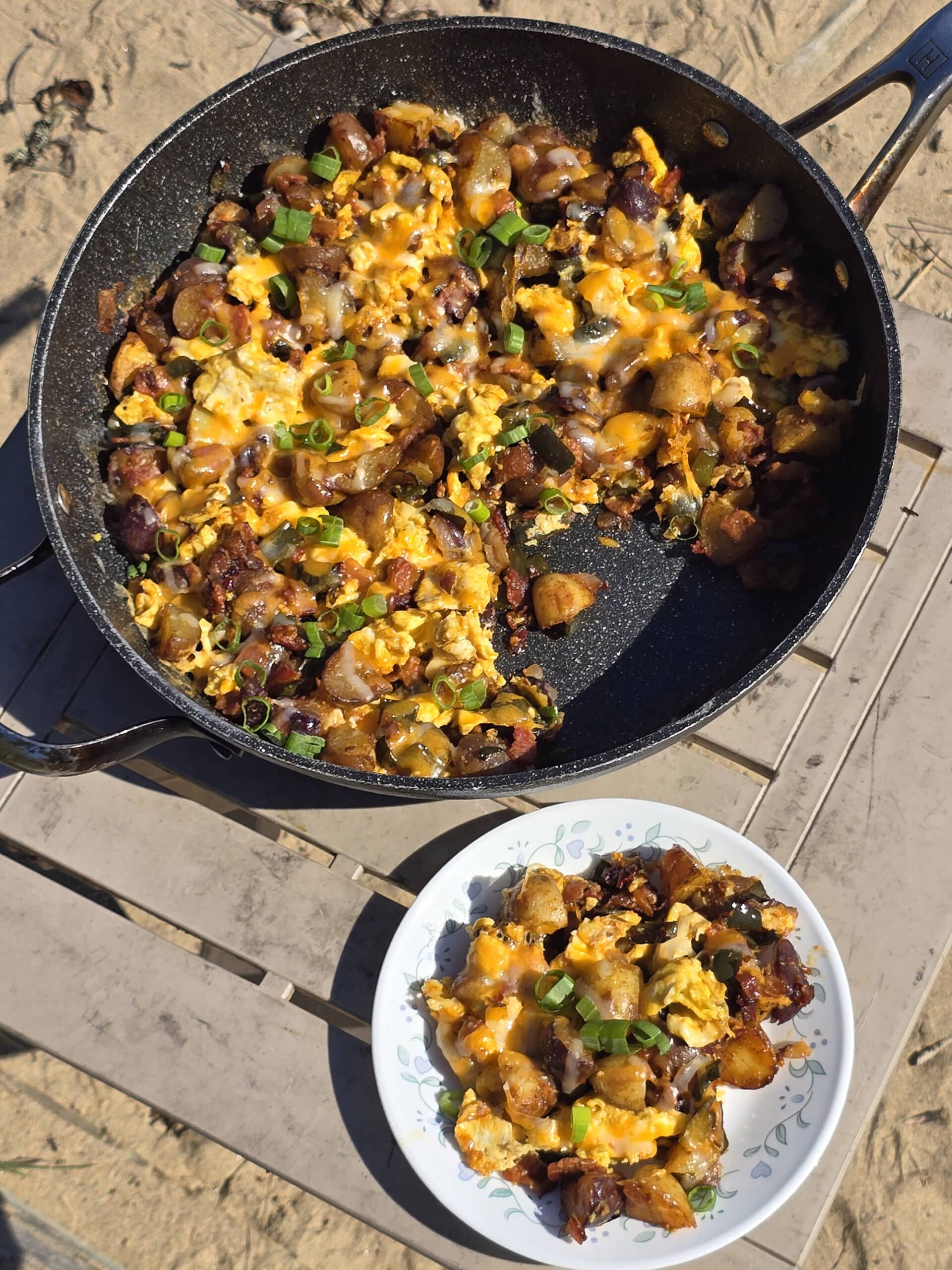 A pan and plate of smoky garlic chipotle breakfast hash.