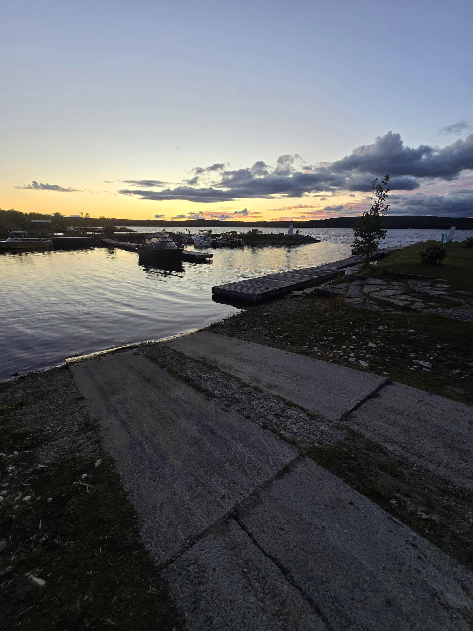 Sunset over a small boat marina on Manitoulin Island.