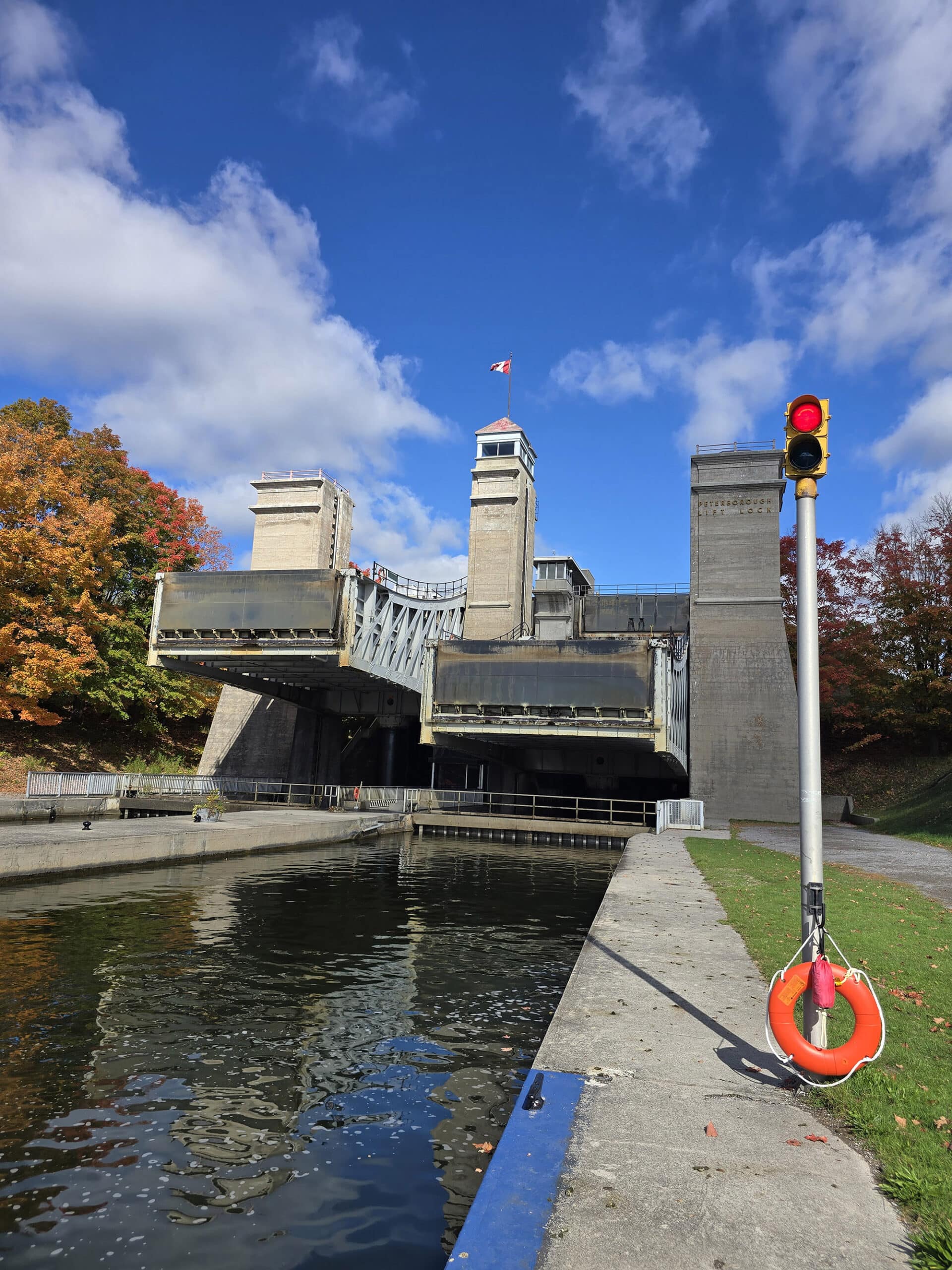 The Peterborough Lift Lock surrounded by trees in full fall colour.