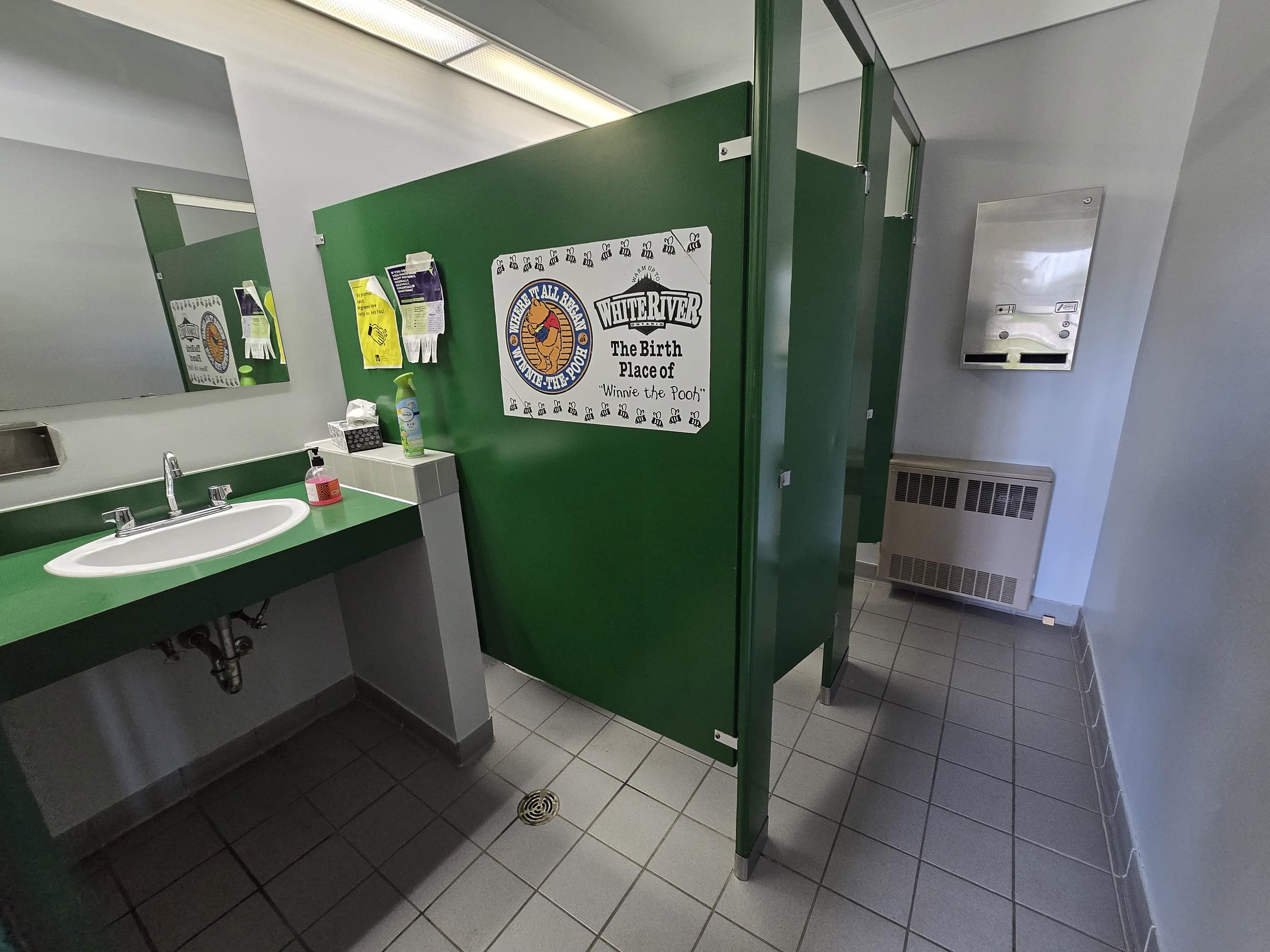 A small public washroom at winnie the pooh park.