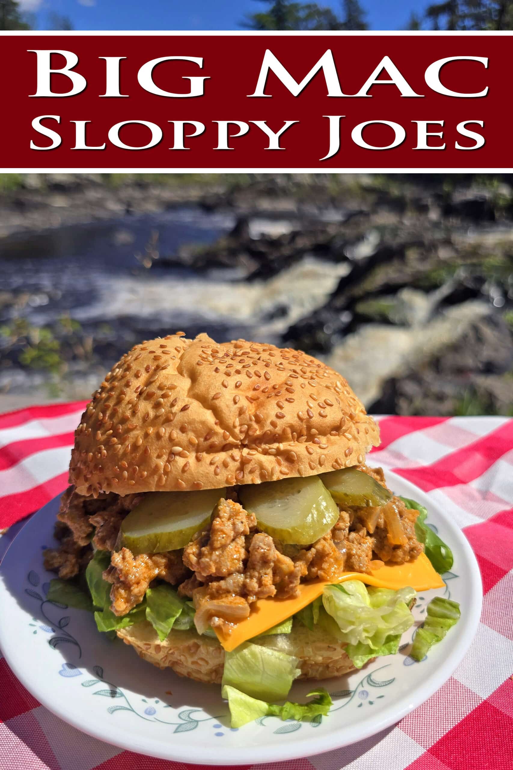 A big mac sloppy joe sandwich on a plate in front of a waterfall. Lettuce, pickles, and cheese are visible, and overlaid text says big mac sloppy joes.