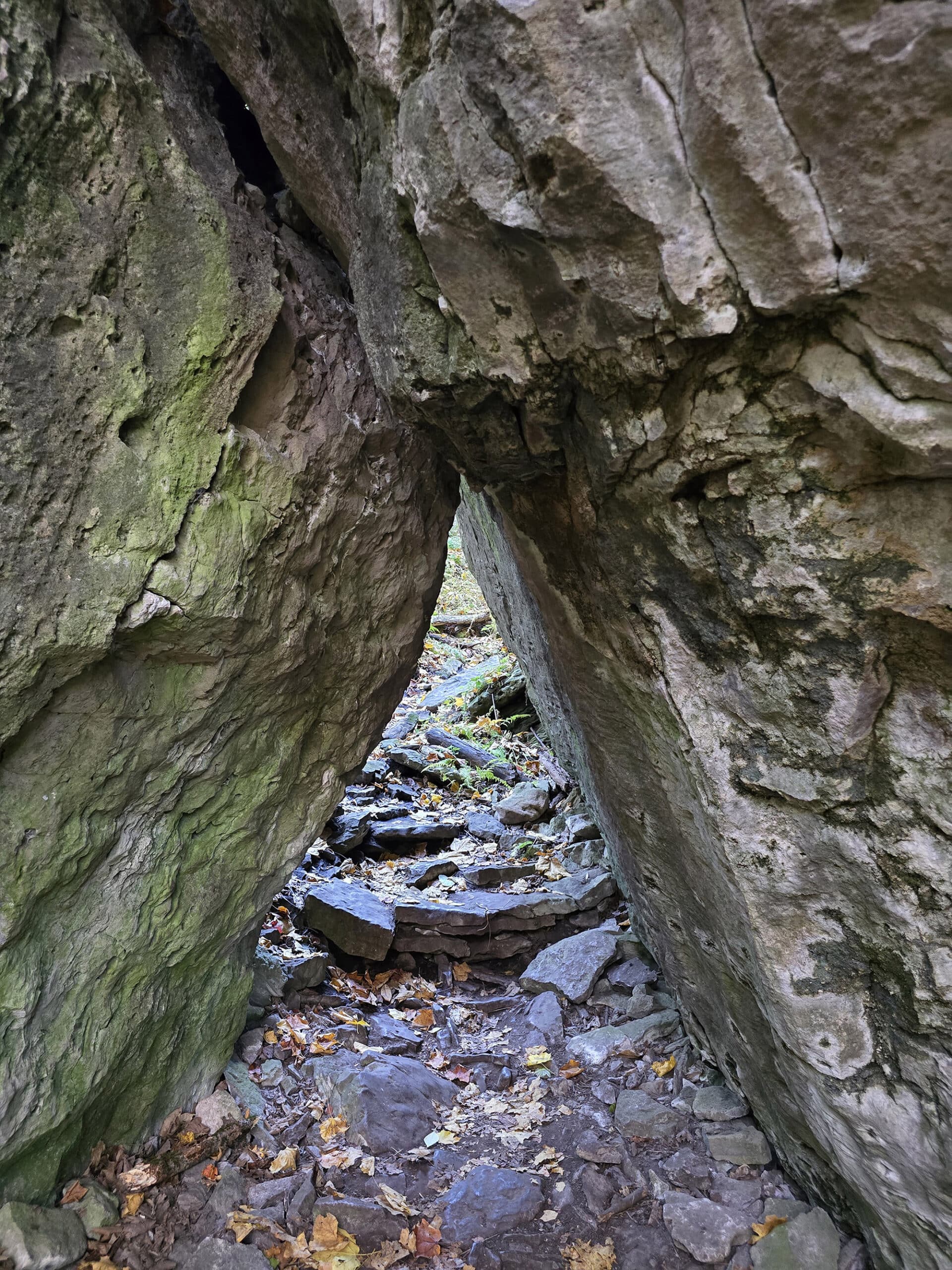 A small opening between two large boulders.