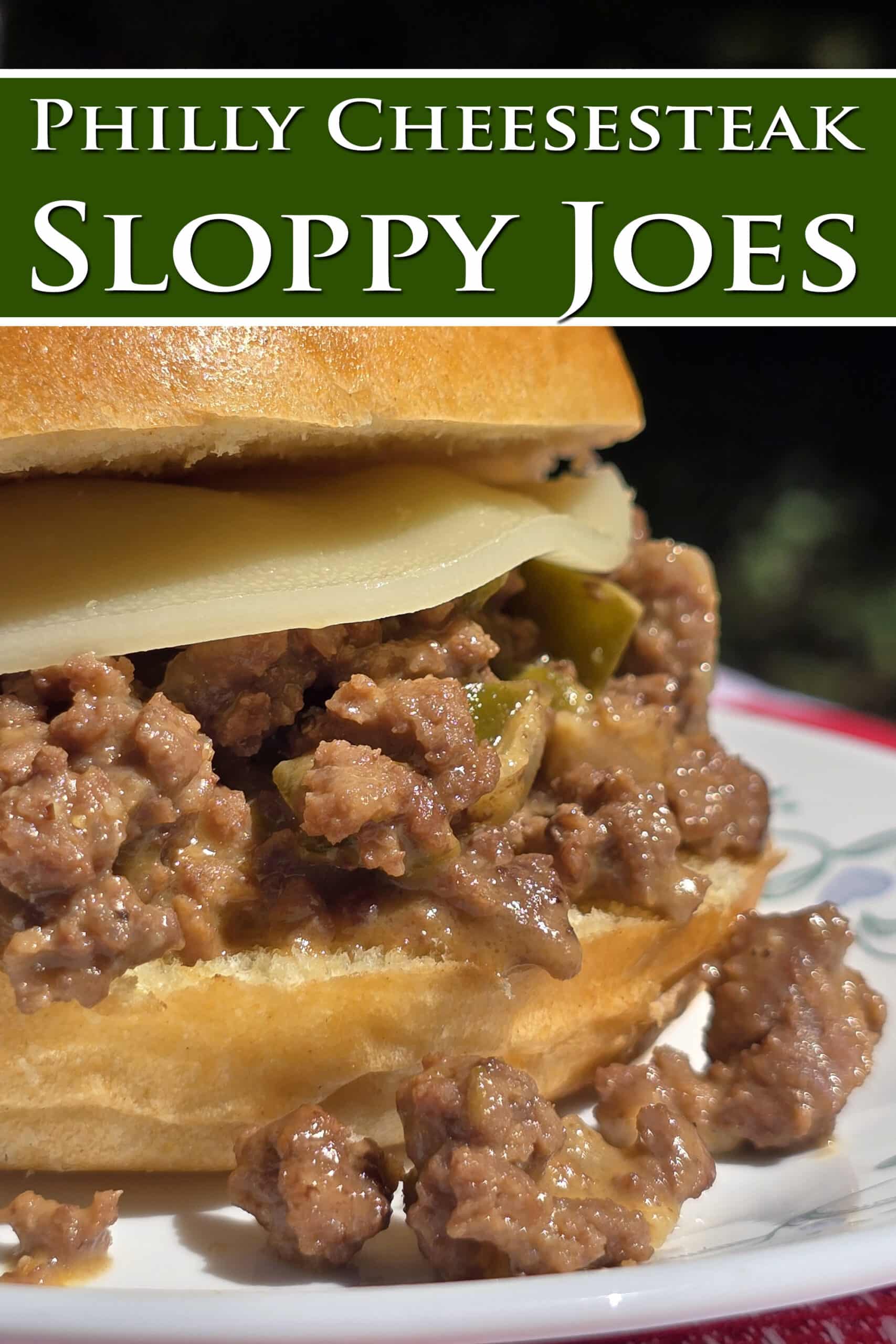 A Philly Cheesesteak Sloppy Joe sandwich with cheese sauce and provolone.  Overlaid text says Philly Cheesesteak Sloppy Joes.