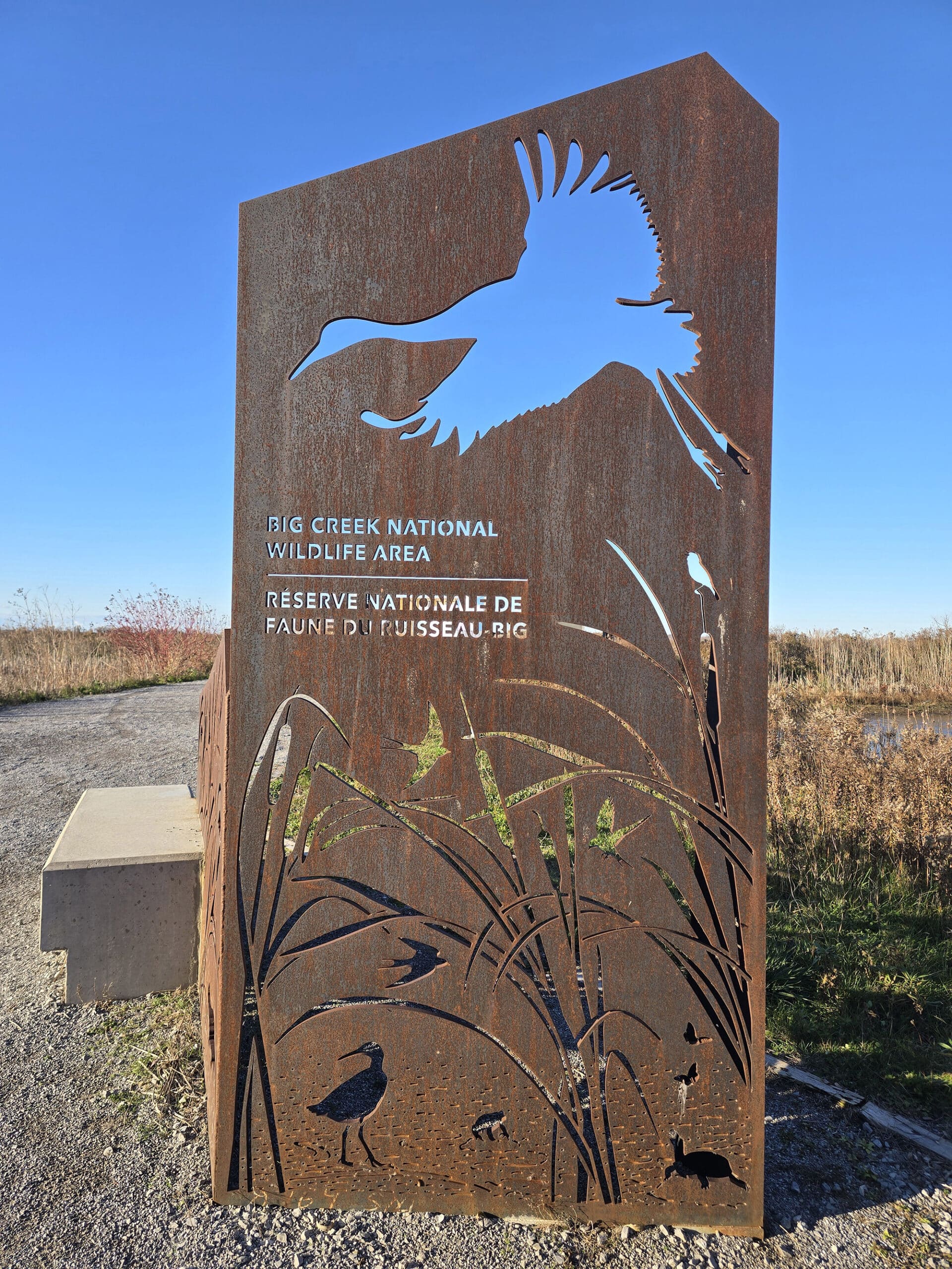 A decorative cutout sign at big creek national wildlife area.