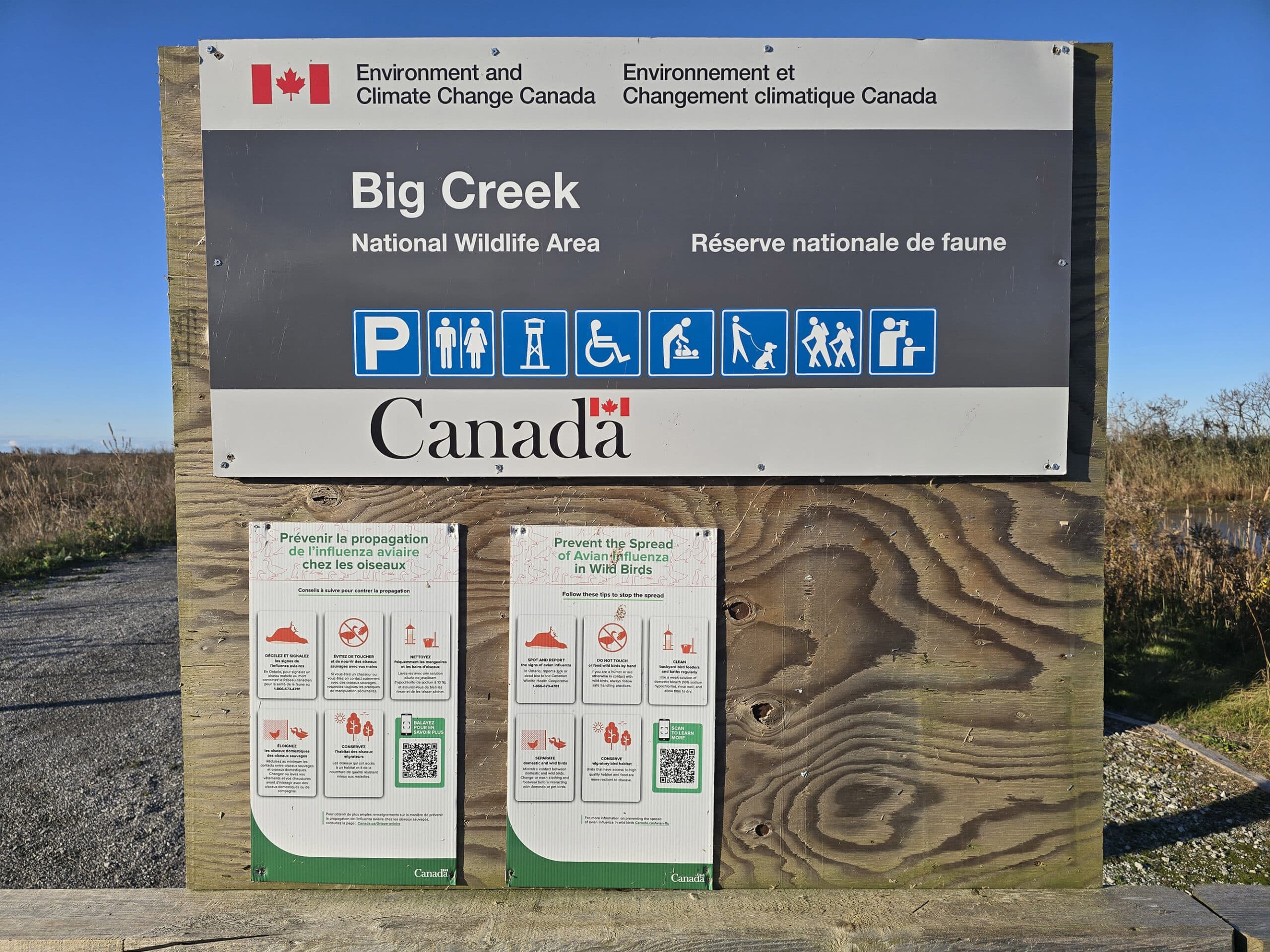 A Government of Canada sign for Big Creek National Wildlife Area.