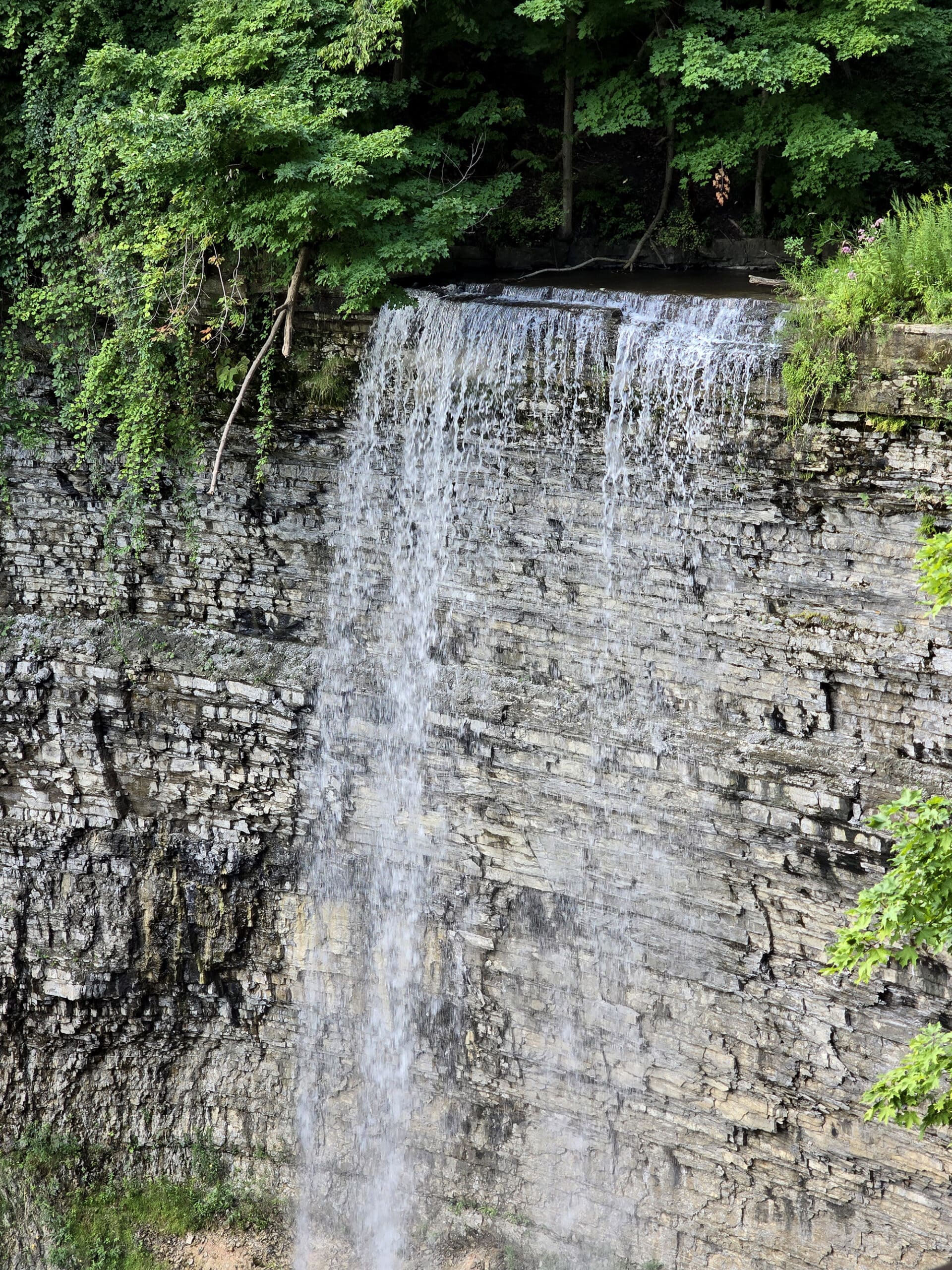 The Tew Falls waterfall, in summer.