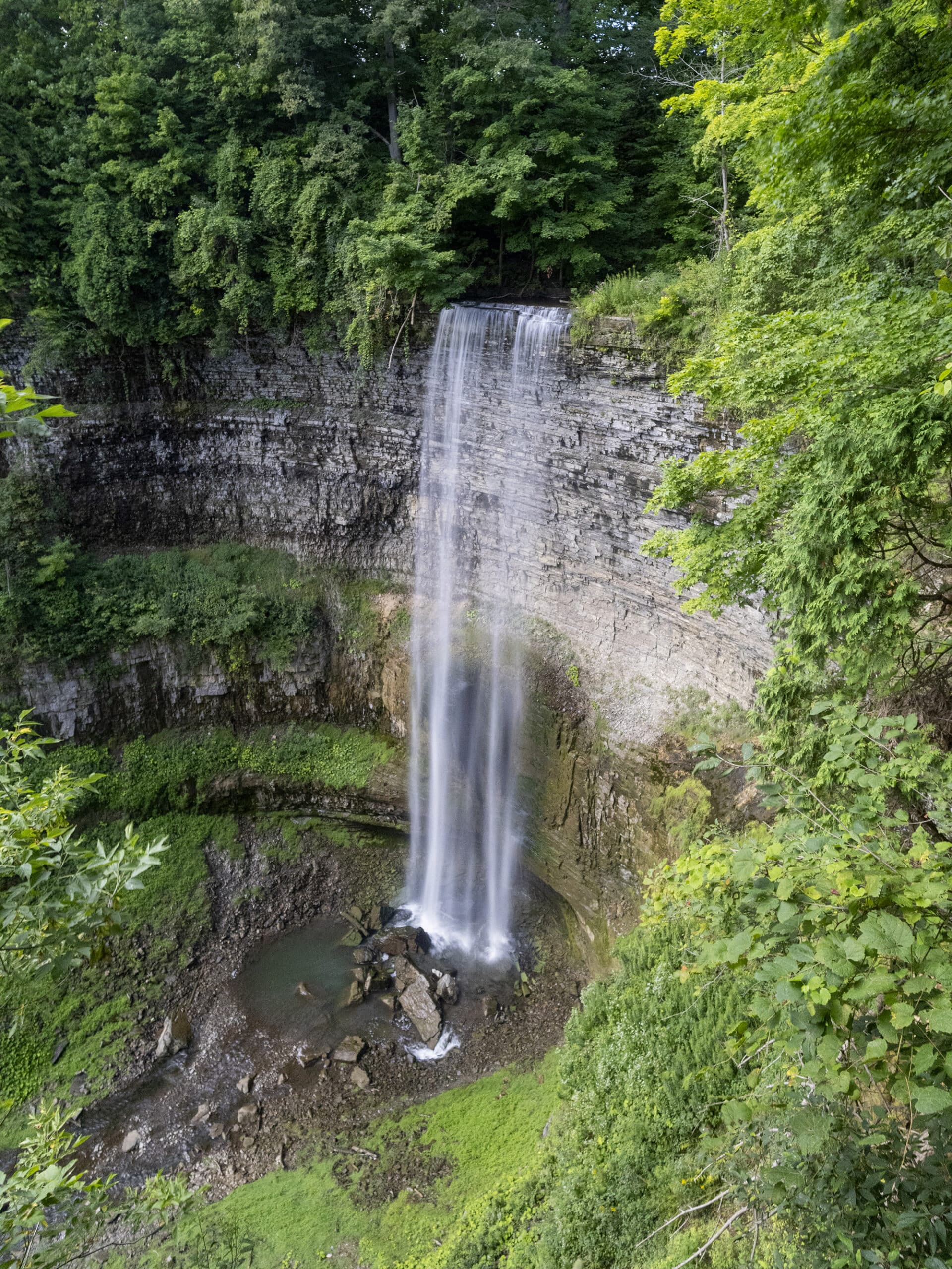 The Tew Falls waterfall, in summer.