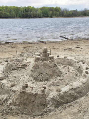 A sandcastle on an Ottawa River beach at Voyageur Provincial Park.