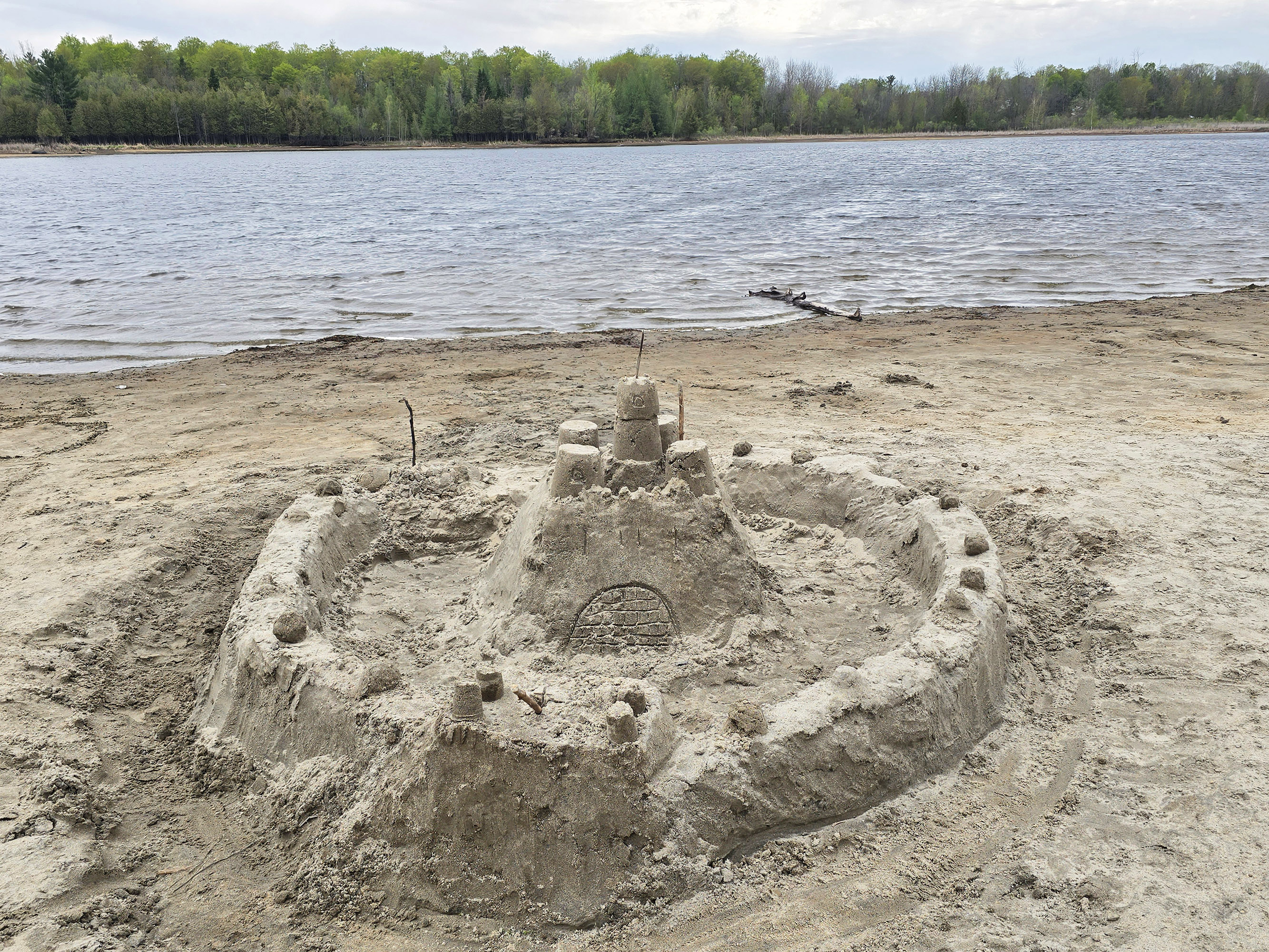 A sandcastle on an Ottawa River beach at Voyageur Provincial Park.