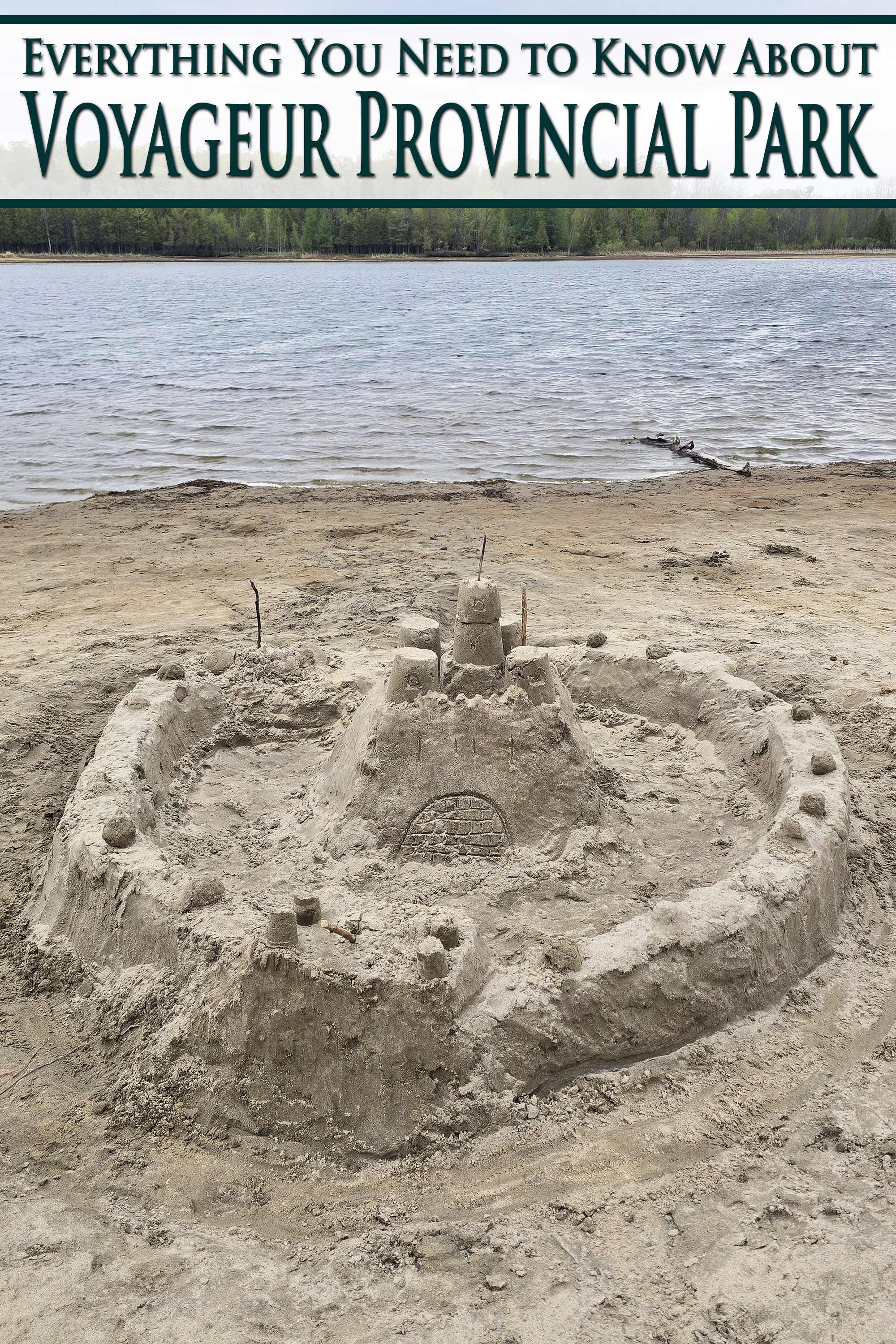 A sandcastle on a beach. Overlaid text says everything you need to know about voyageur provincial park.