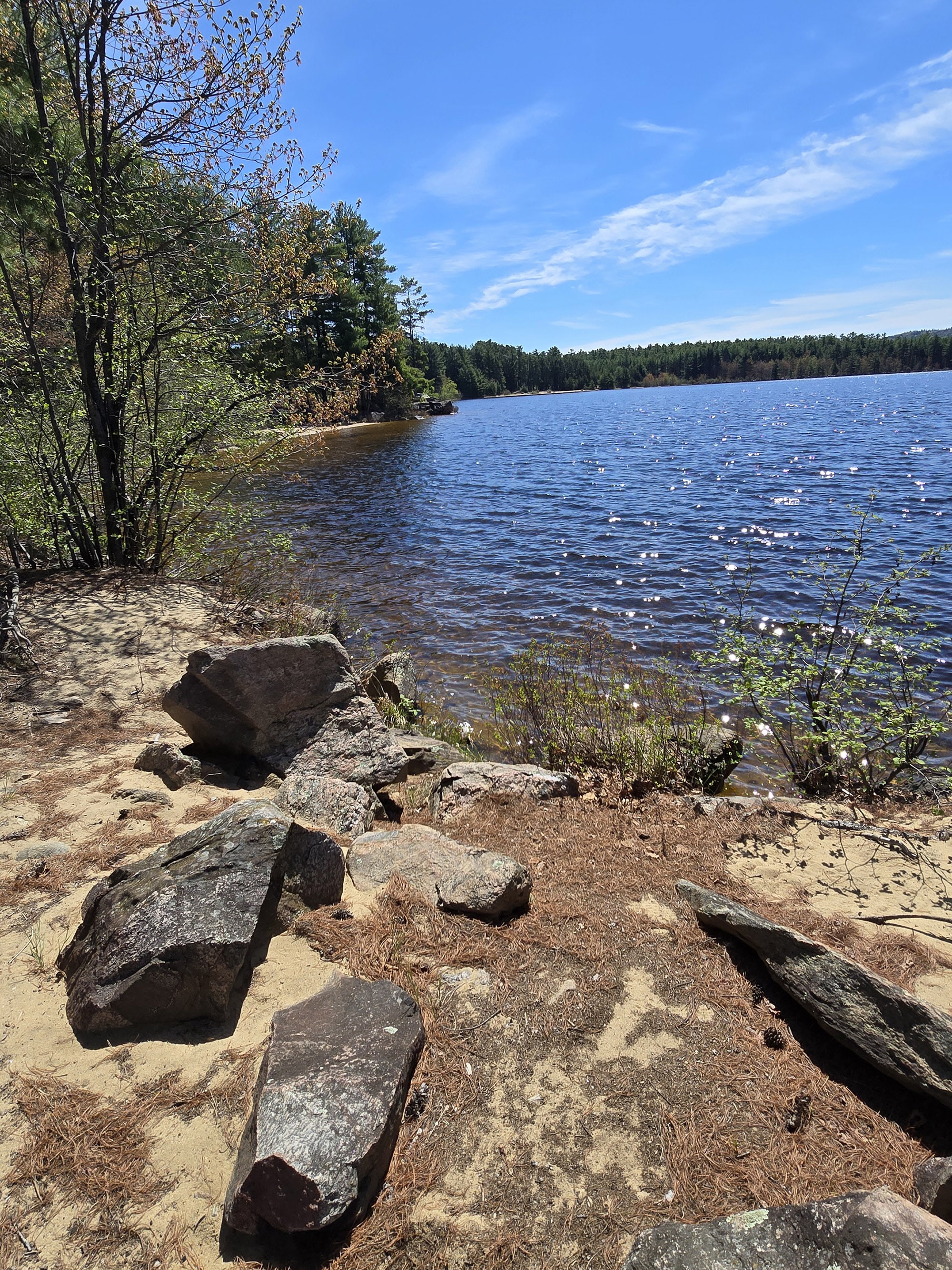 A rocky beach on Grand Lake.
