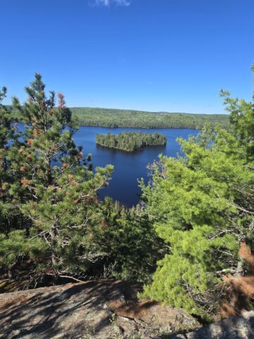 A view from the Centennial Ridges HIking trail, looking down on a small island below.