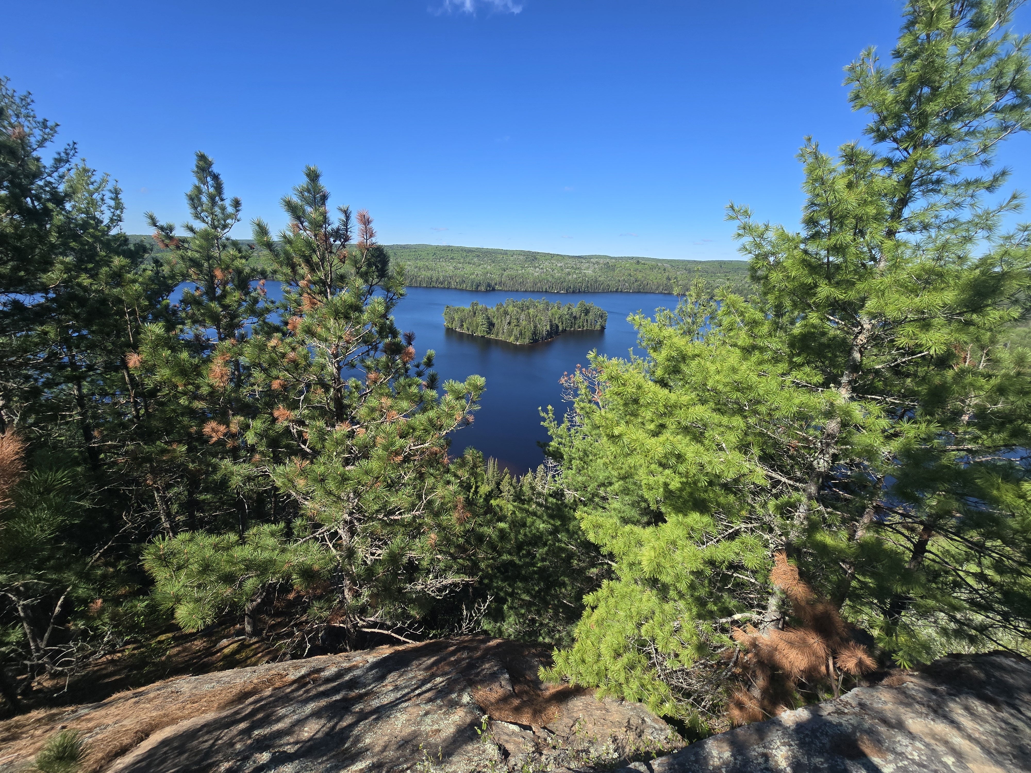 A view from the Centennial Ridges HIking trail, looking down on a small island below.