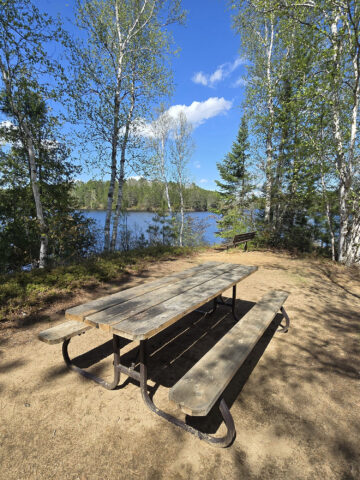 A picnic table on a peninsula over Lake St Peter.