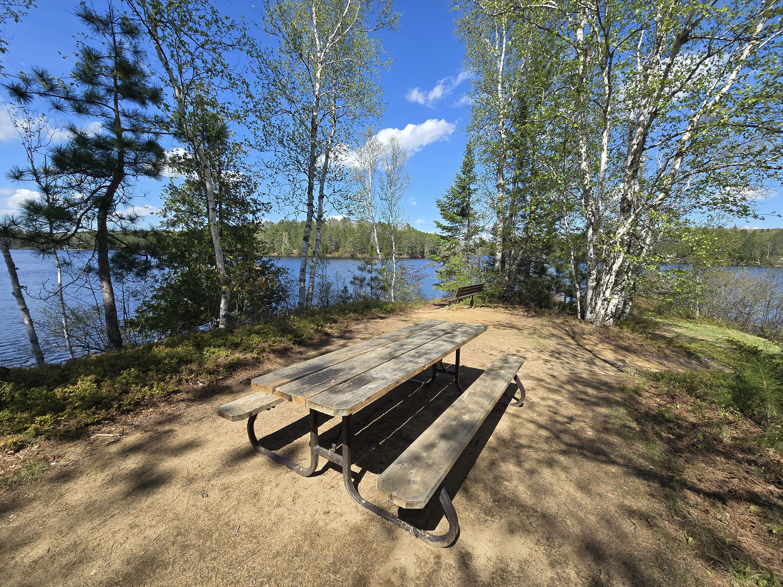 A picnic table on a peninsula over Lake St Peter.