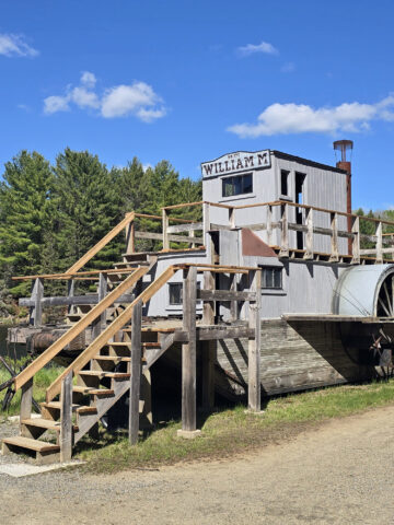 An alligator logging boat on the side of the logging museum trail at Algonquin Provincial Park.
