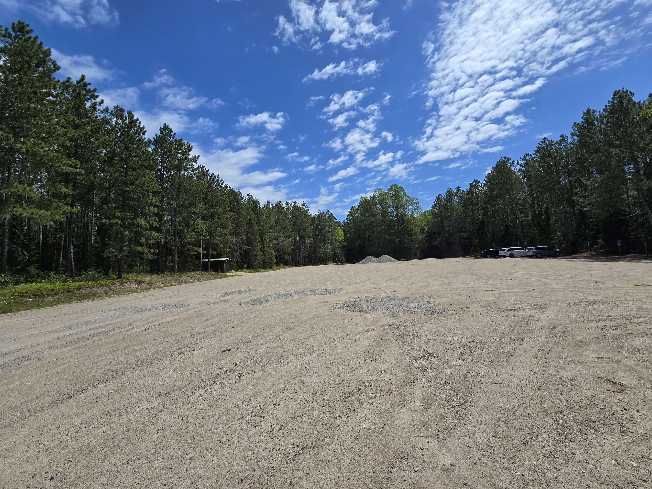 A large parking lot at the logging museum trail in Algonquin Provincial Park.