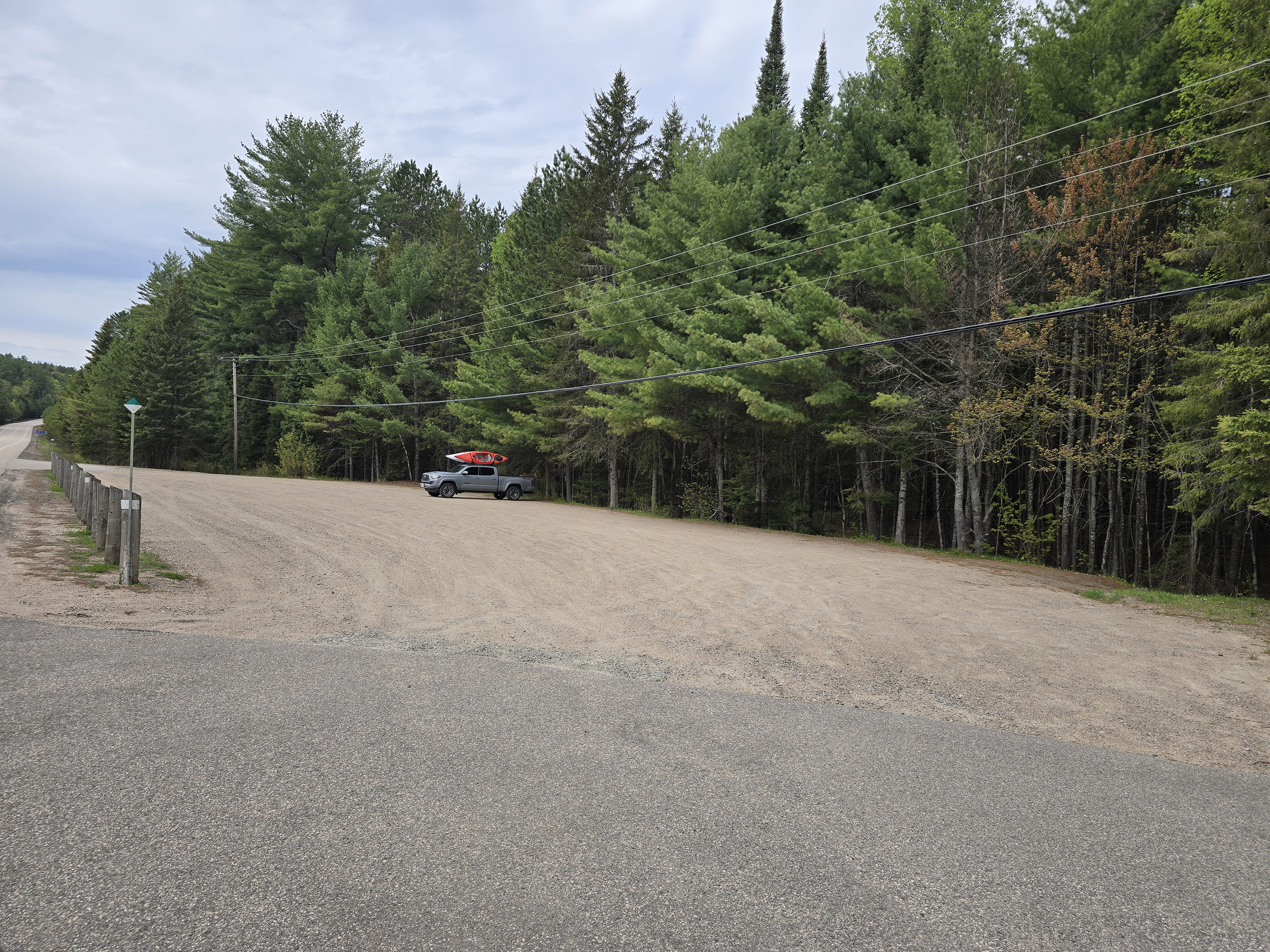 A parking lot on the side of Highway 60 in Algonquin Provincial Park.