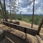 A bench overlooking a cliff, along the Lookout Trail in Algonquin Provincial Park.