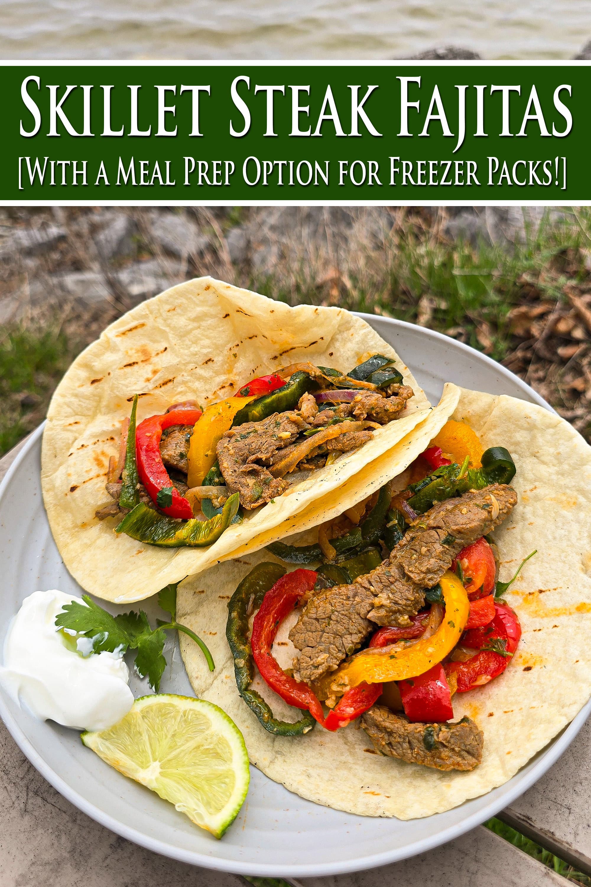 2 steak and pepper fajitas on a plate with sour cream and a slice of lime. Overlaid text says skillet steak fajitas with a meal prep option for freezer packs.