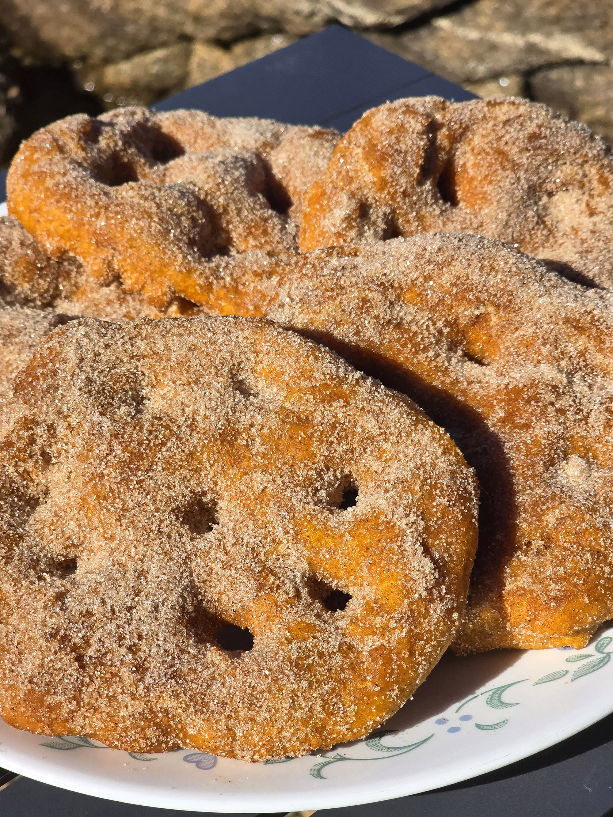 A plate of sugar coated pumpkin spice frybread.